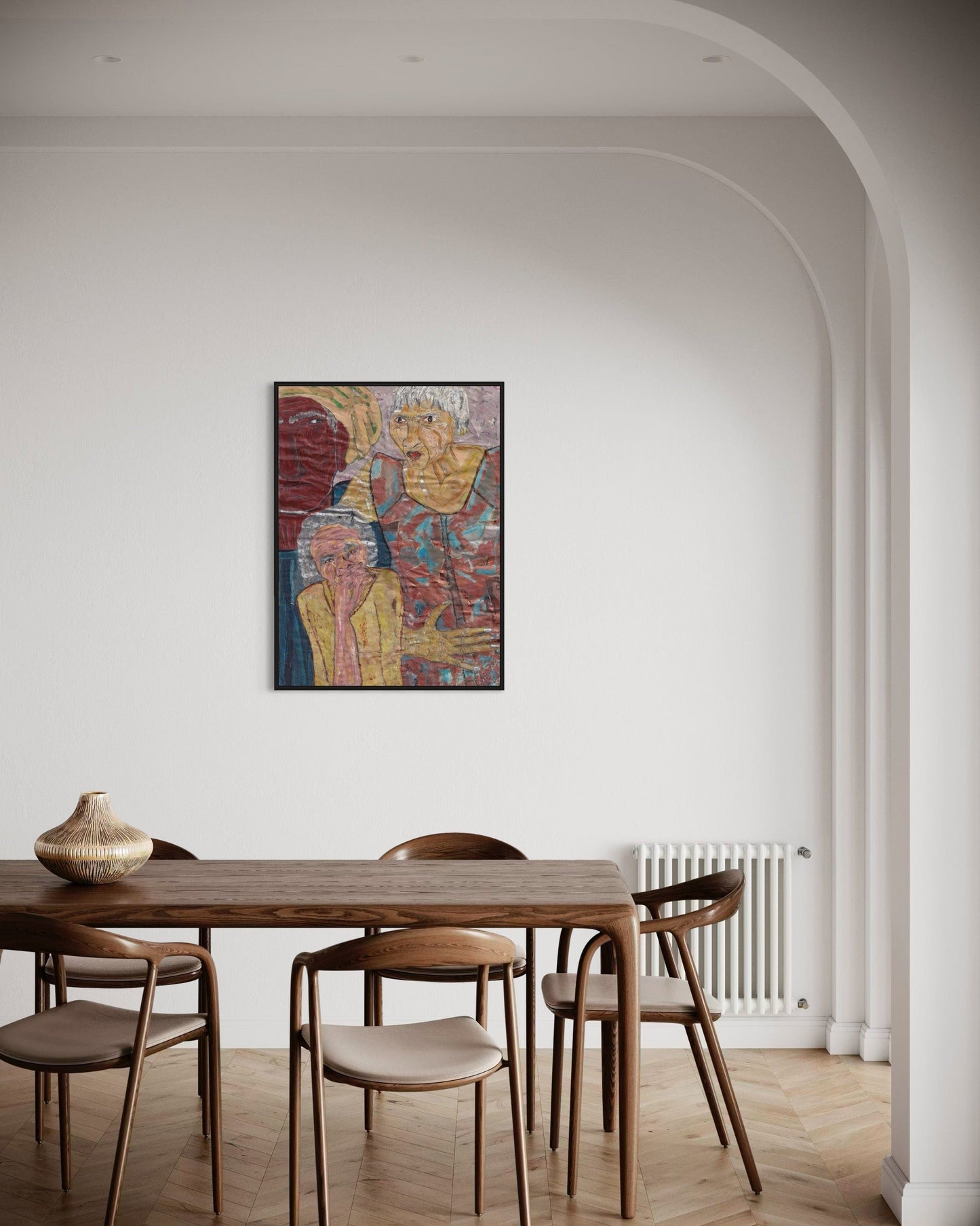 Dining room with wooden table and chairs, colorful abstract painting on wall.