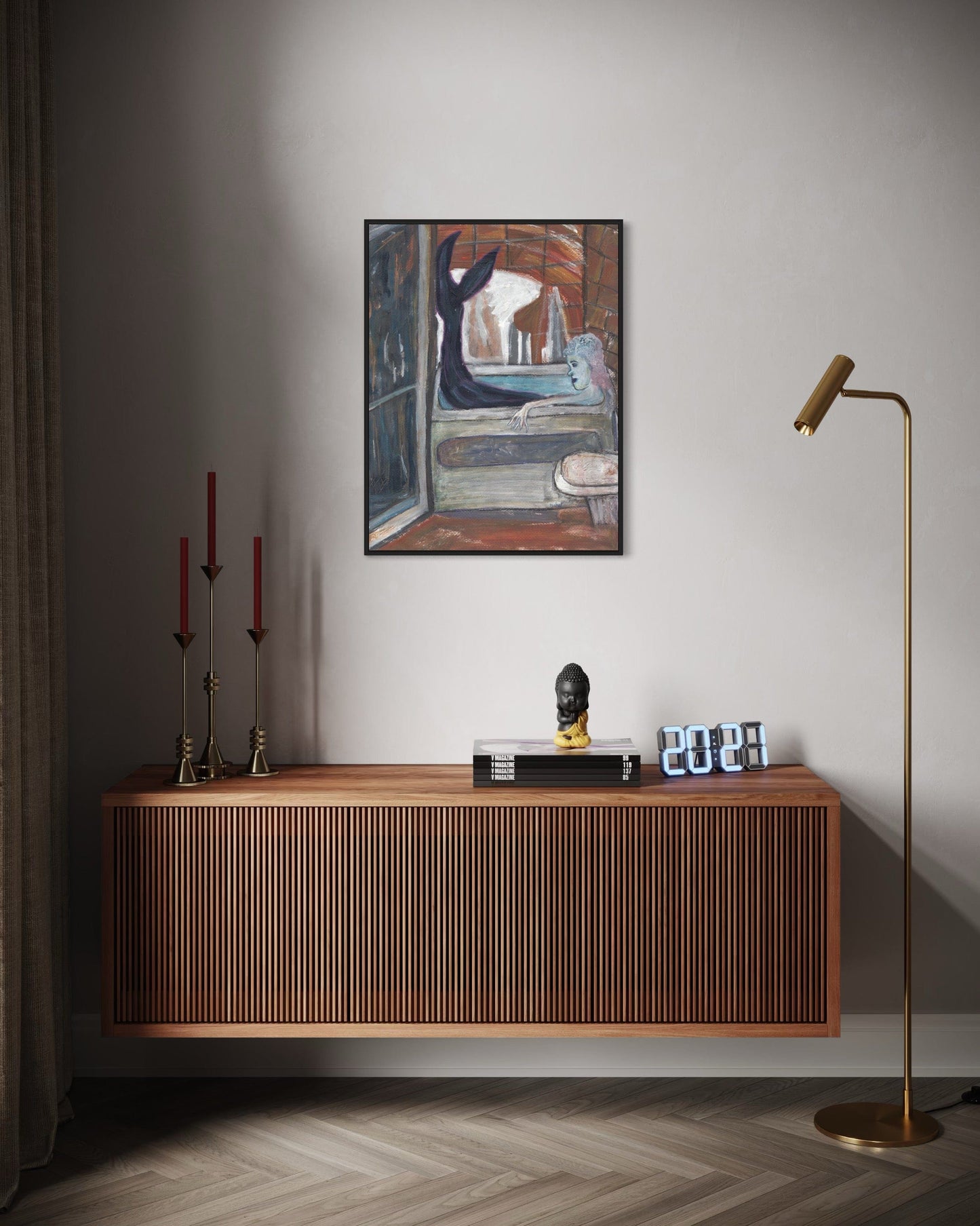 Wooden sideboard with decorative items against a wall with a painting and clock.