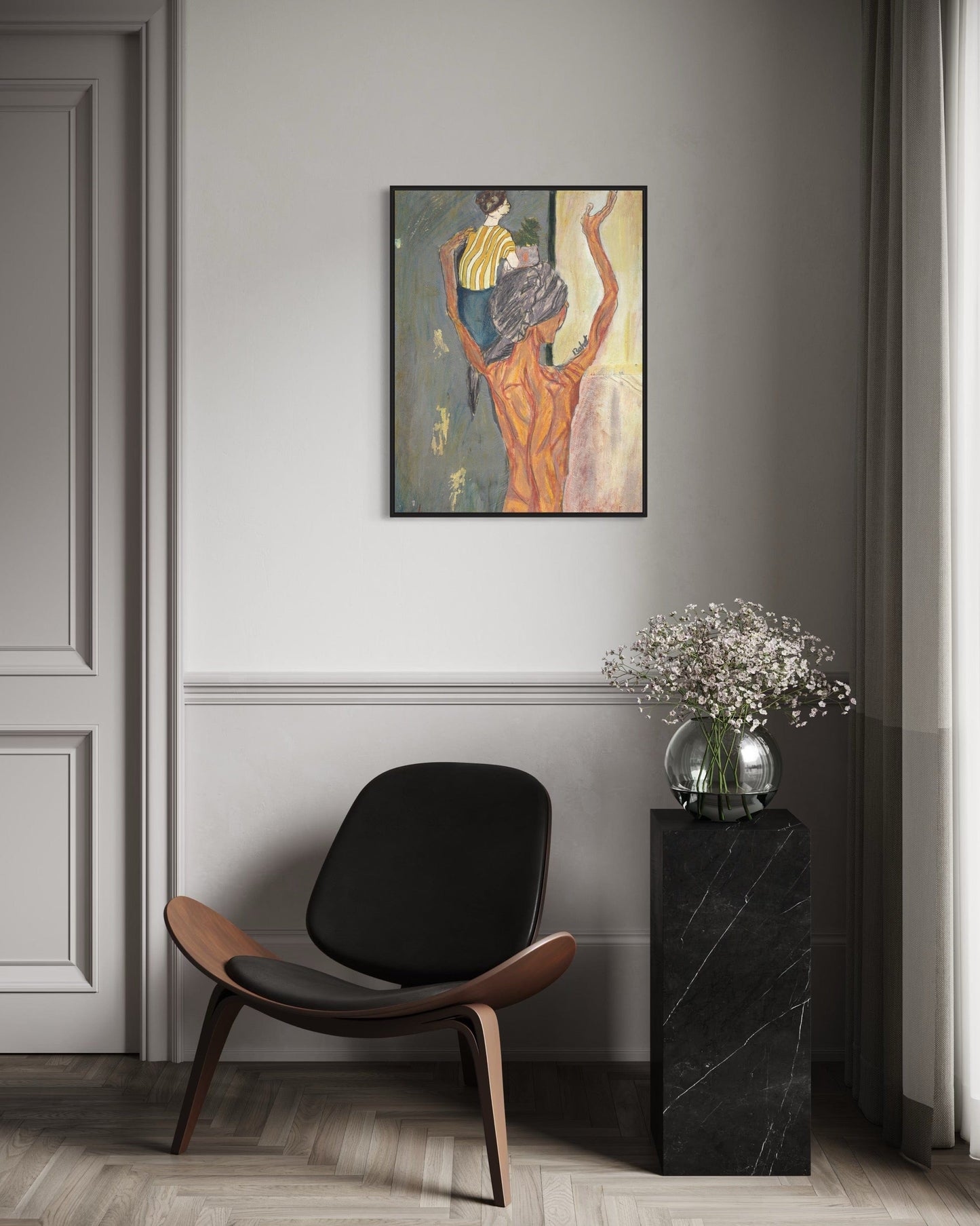 Modern interior with a black chair, marble side table, and abstract painting on a gray wall.
