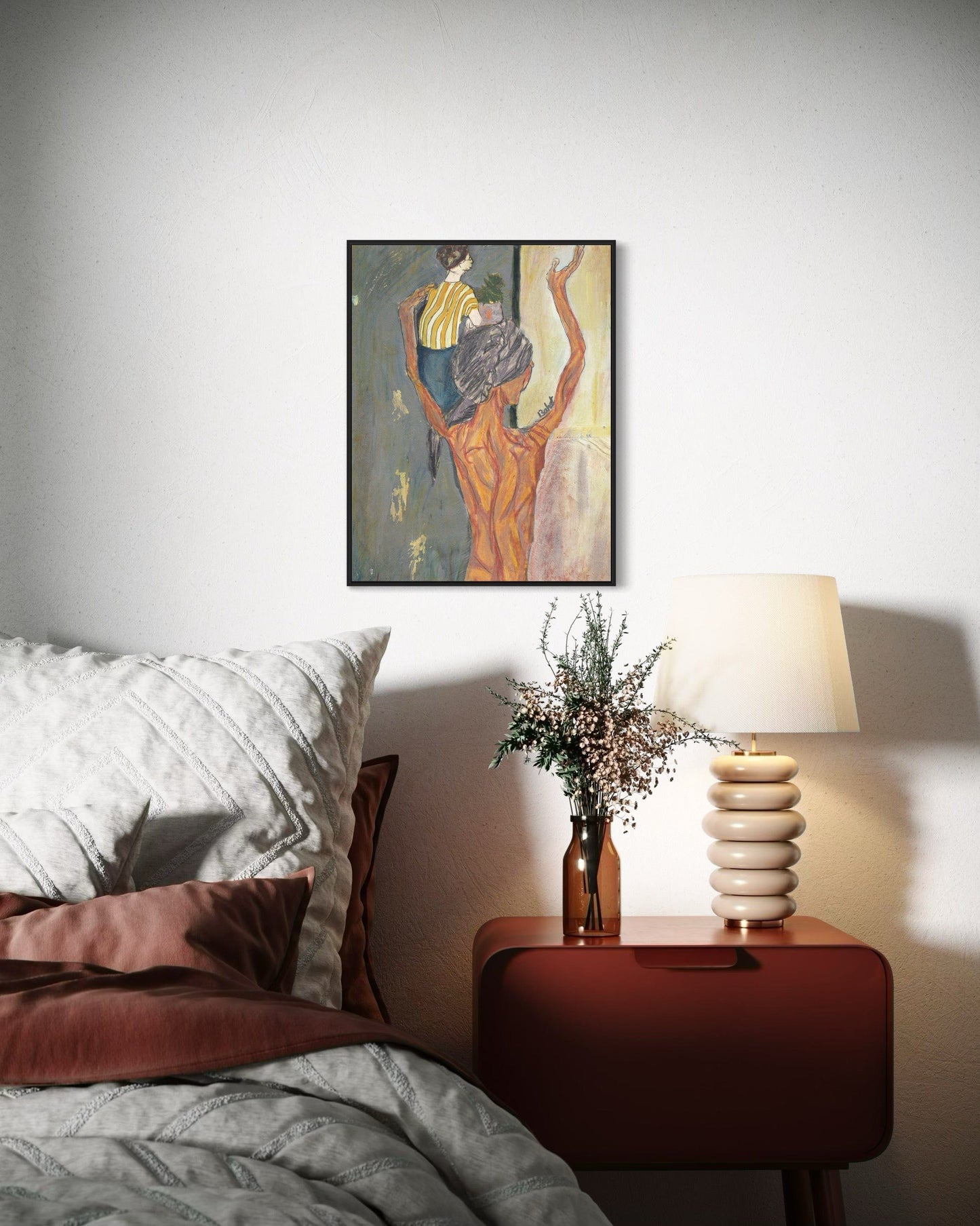 Bedroom with a painting on the wall, a lamp, and a vase on a nightstand.