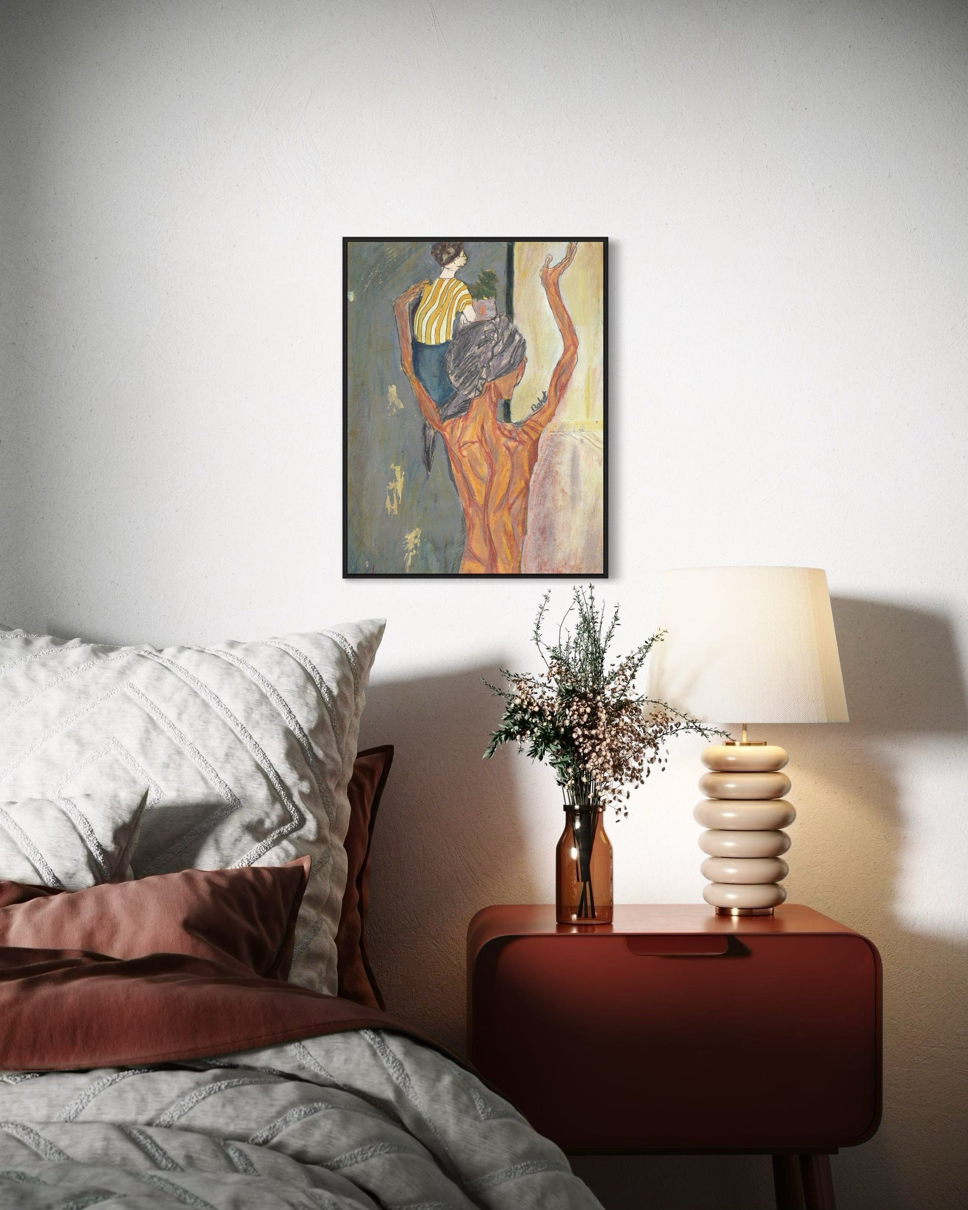 Bedroom with a painting on the wall, a lamp, and a vase on a nightstand.