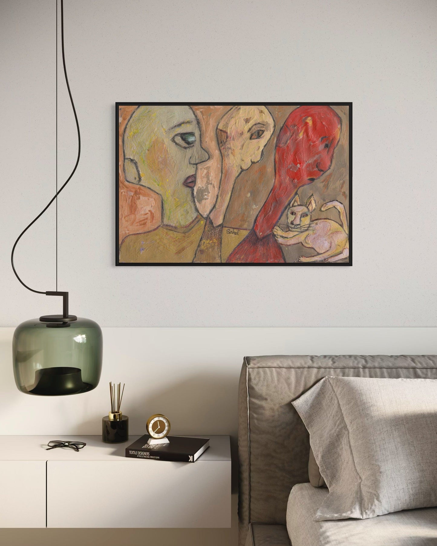 Modern living room with abstract art on the wall, a gray sofa, and decorative items.
