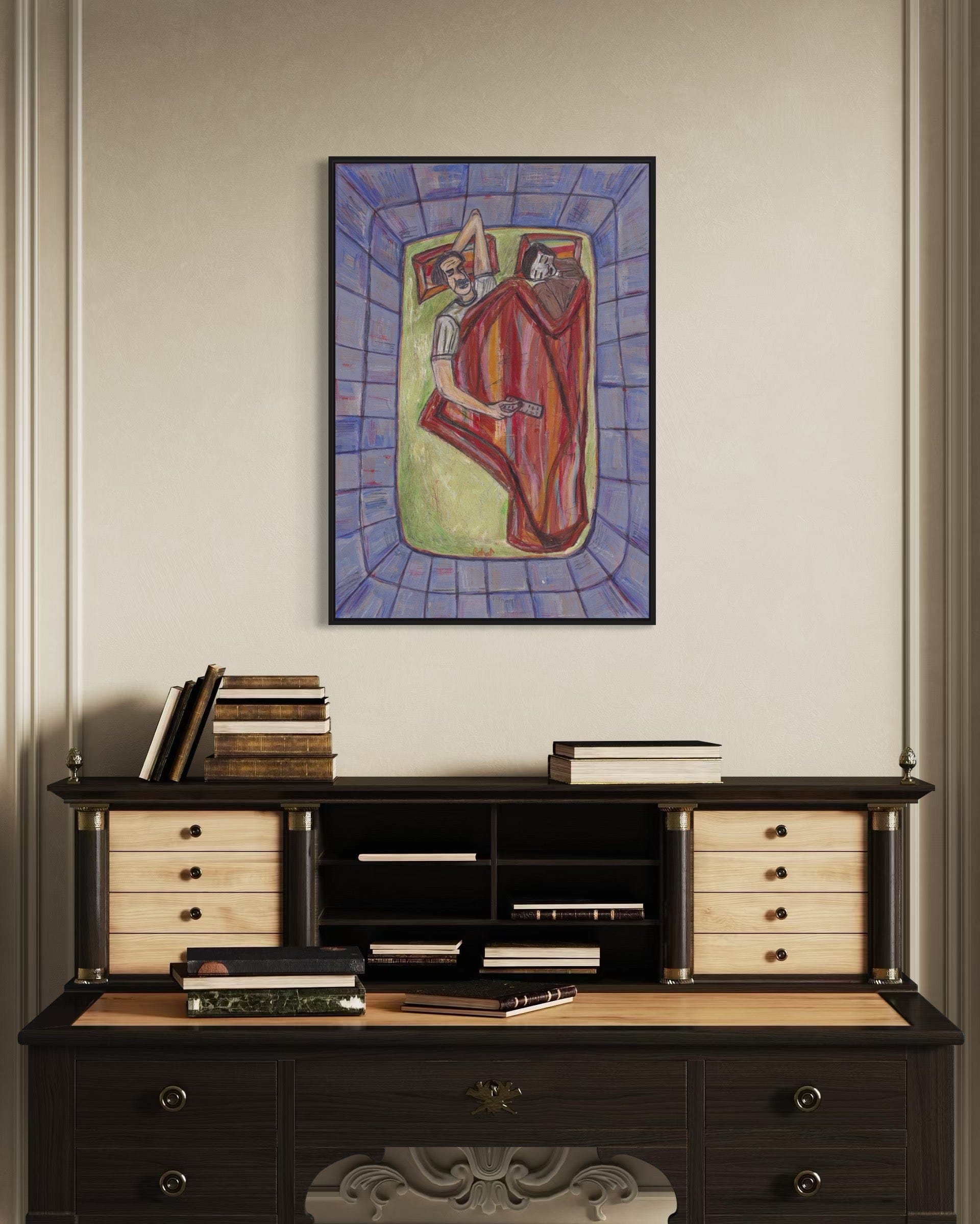 Wooden desk with books and a colorful abstract painting on the wall.