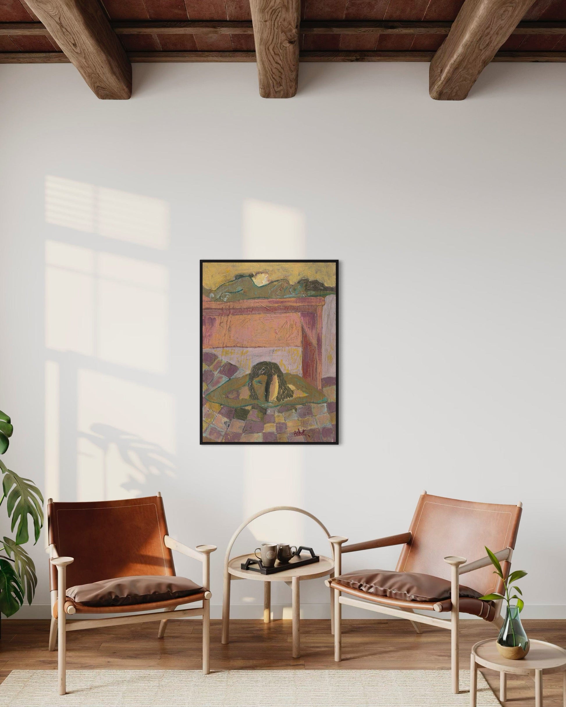 Two leather chairs in a room with a abstract painting on the wall.