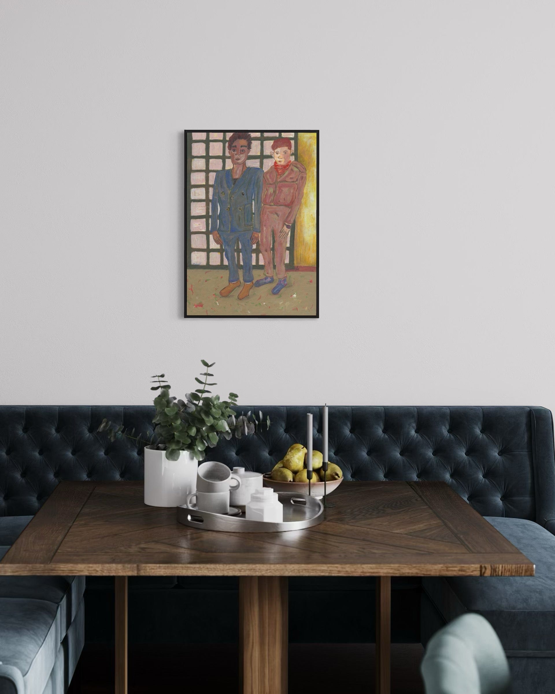 Dining room with a wooden table, gray upholstered chairs, and a framed painting on the wall.
