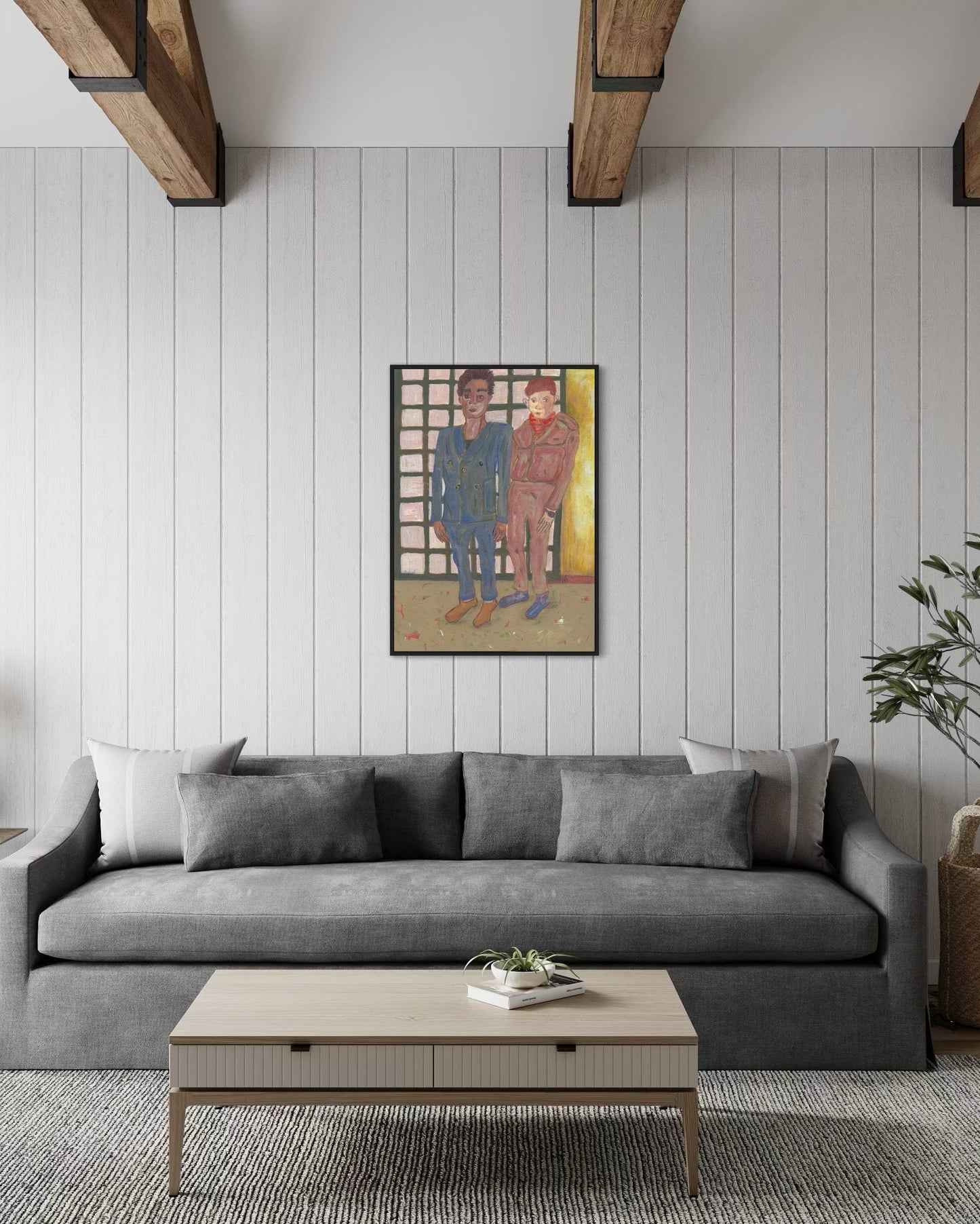 Living room with gray sofa, wooden coffee table, and framed artwork on the wall.