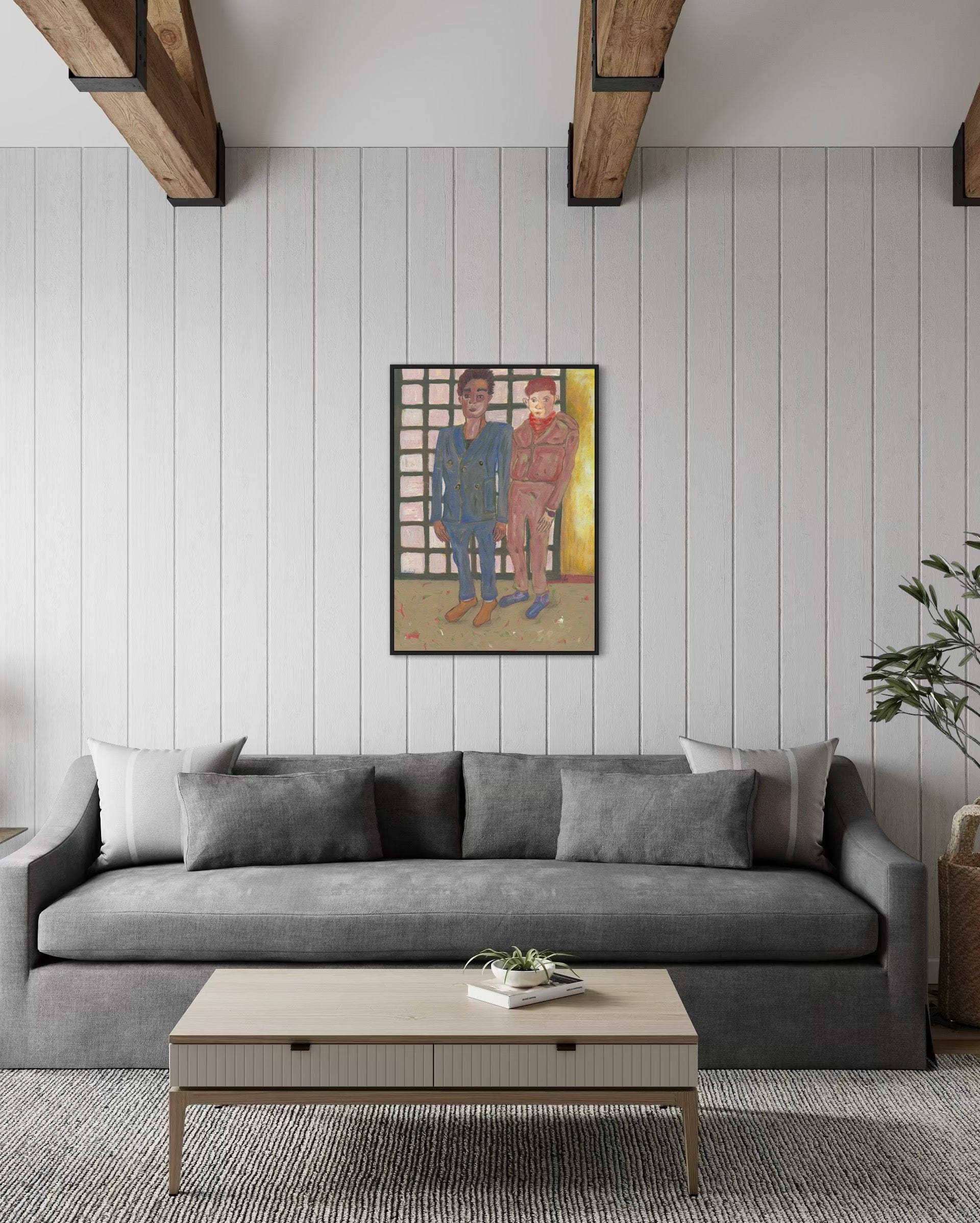Living room with gray sofa, wooden coffee table, and framed artwork on the wall.