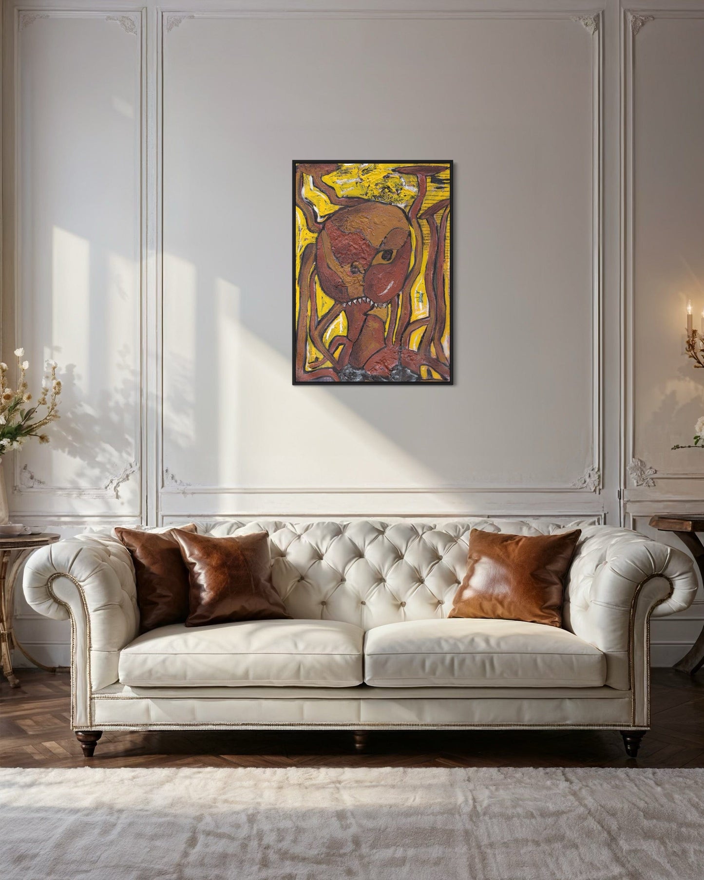 White tufted sofa with brown cushions in a room with a painting on the wall.