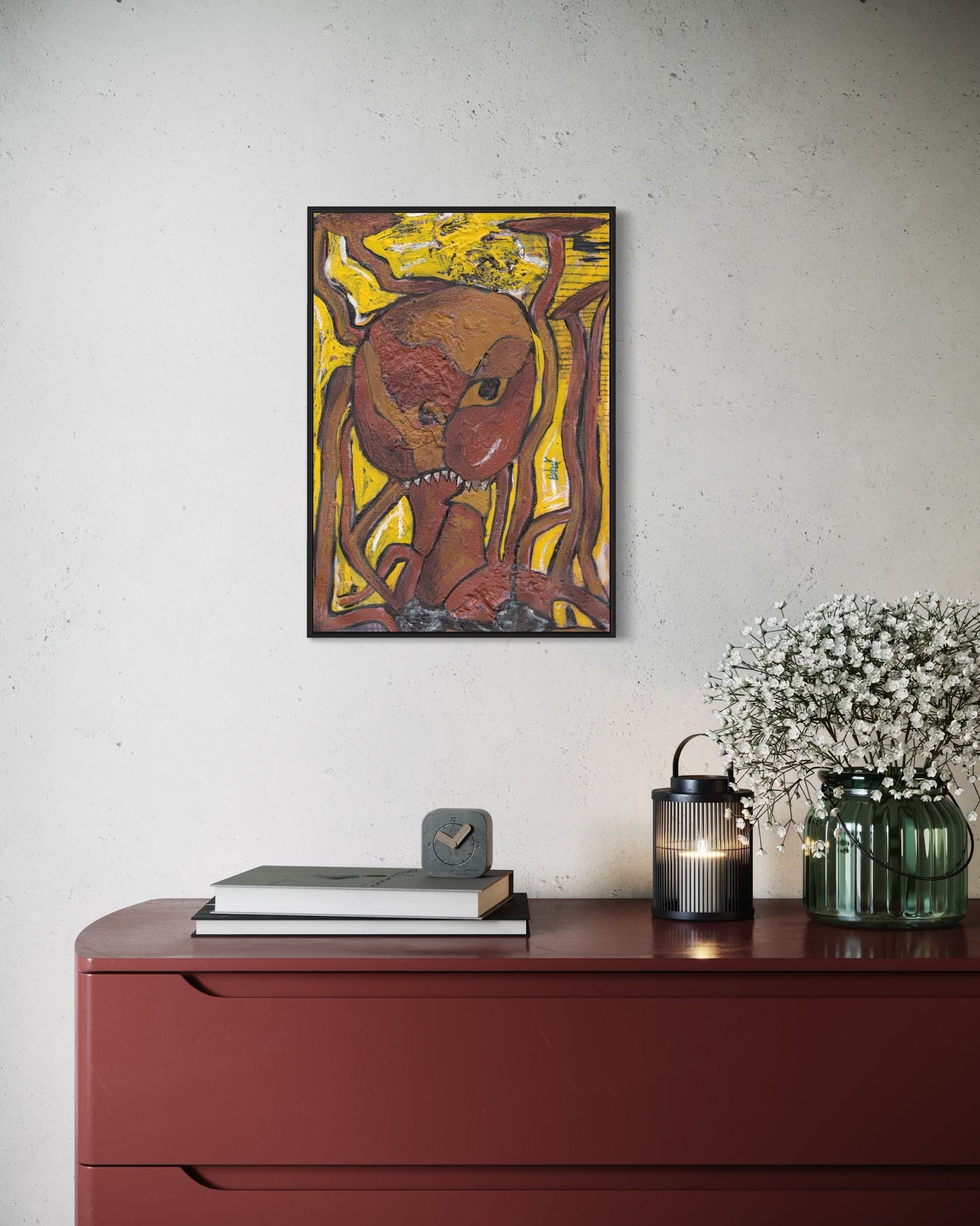 Framed abstract painting on a wall above a red dresser with decorative items.