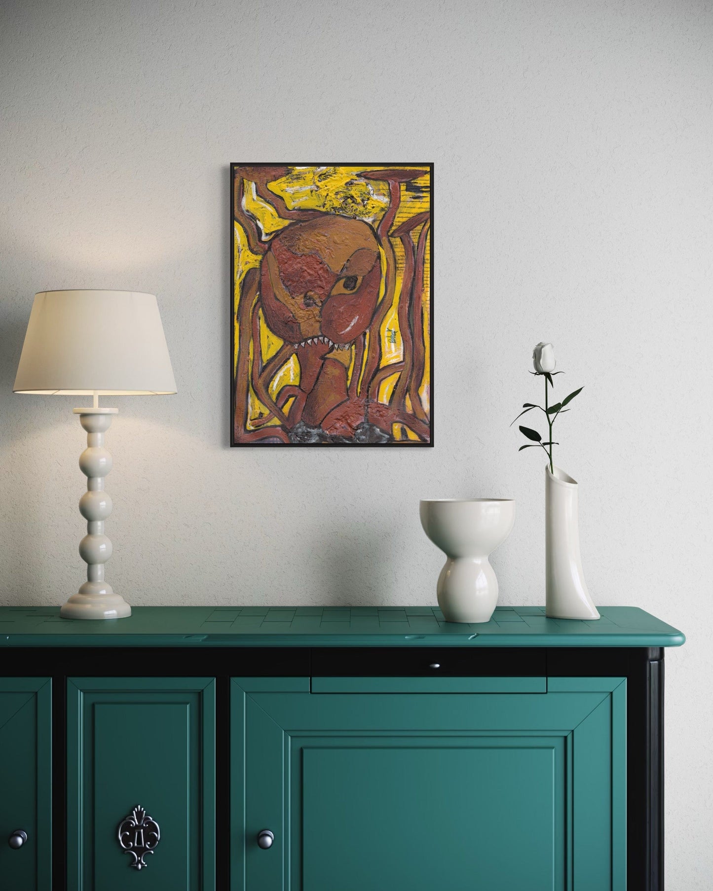 Teal cabinet with a lamp, vase, and abstract painting on a white wall