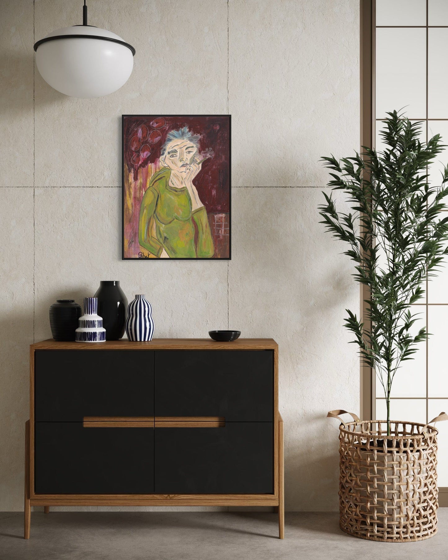 Modern interior with a black dresser, decorative vases, and a plant against a beige wall.