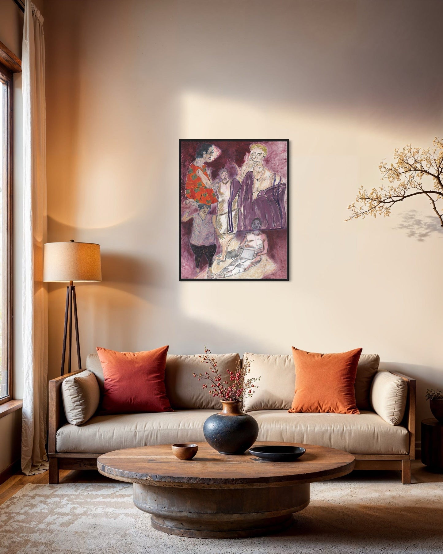 Living room with a couch, coffee table, and wall art