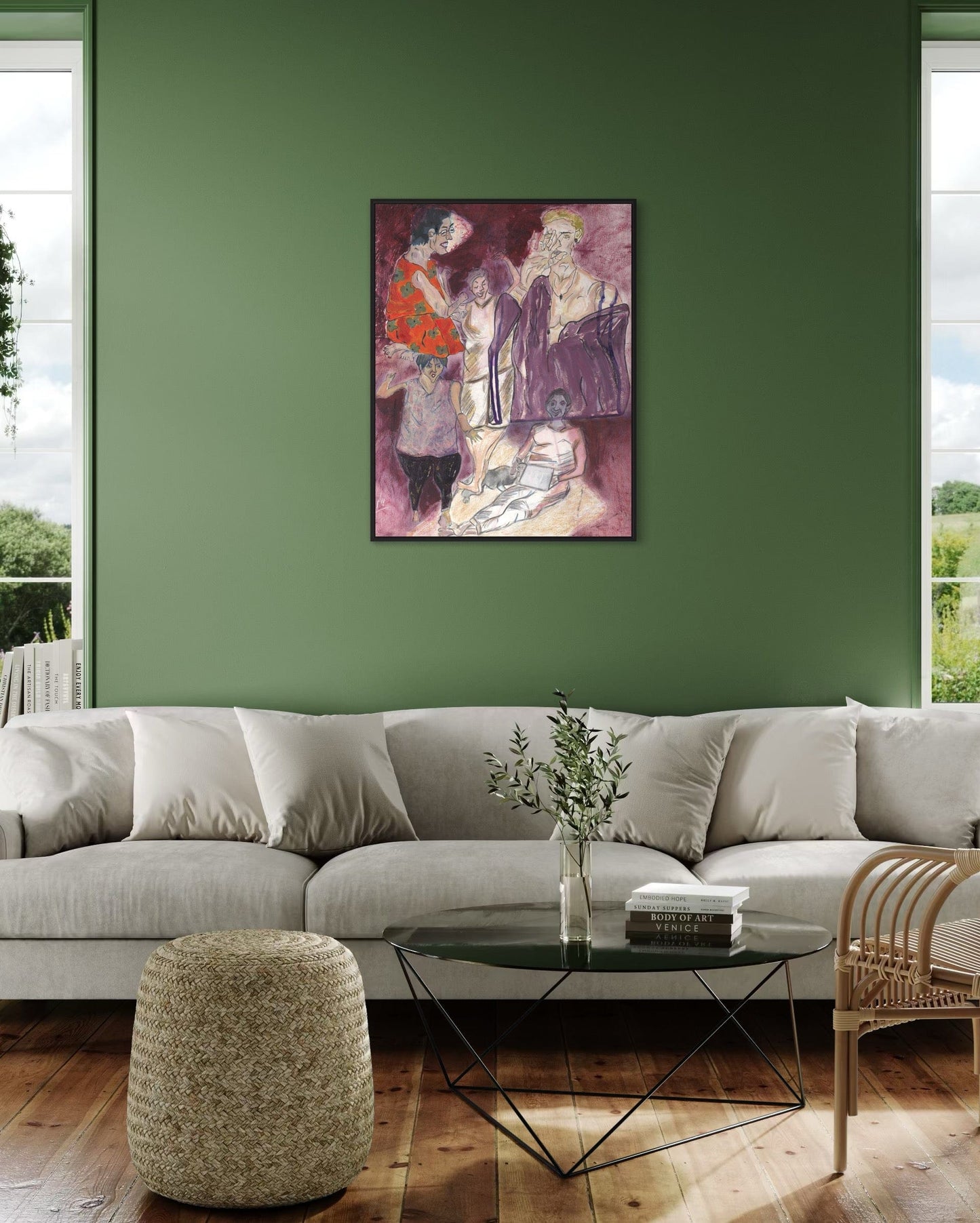 Living room with a gray sofa, round glass coffee table, and a painting on a green wall.