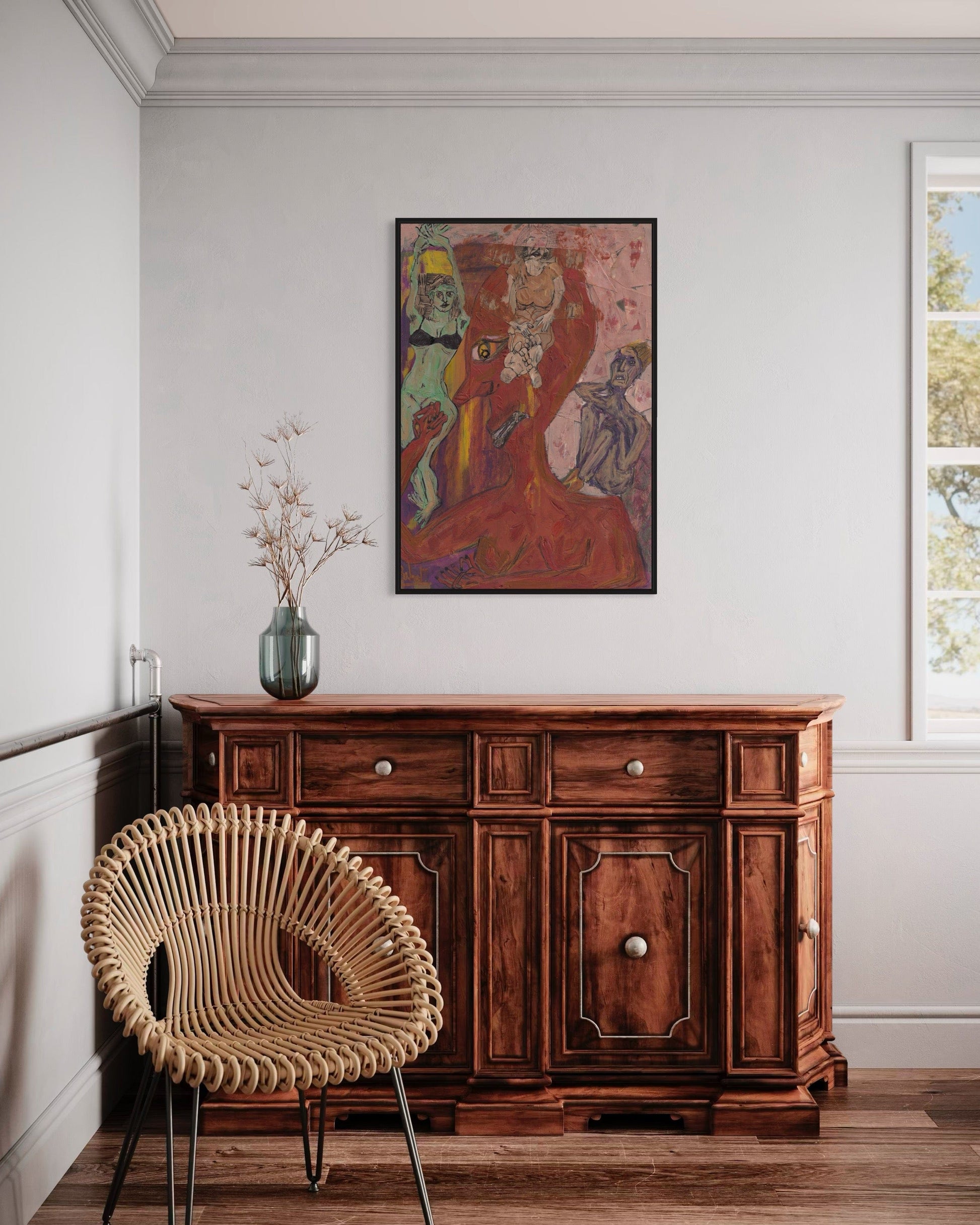 Wooden sideboard with a wicker chair and abstract painting in a room.