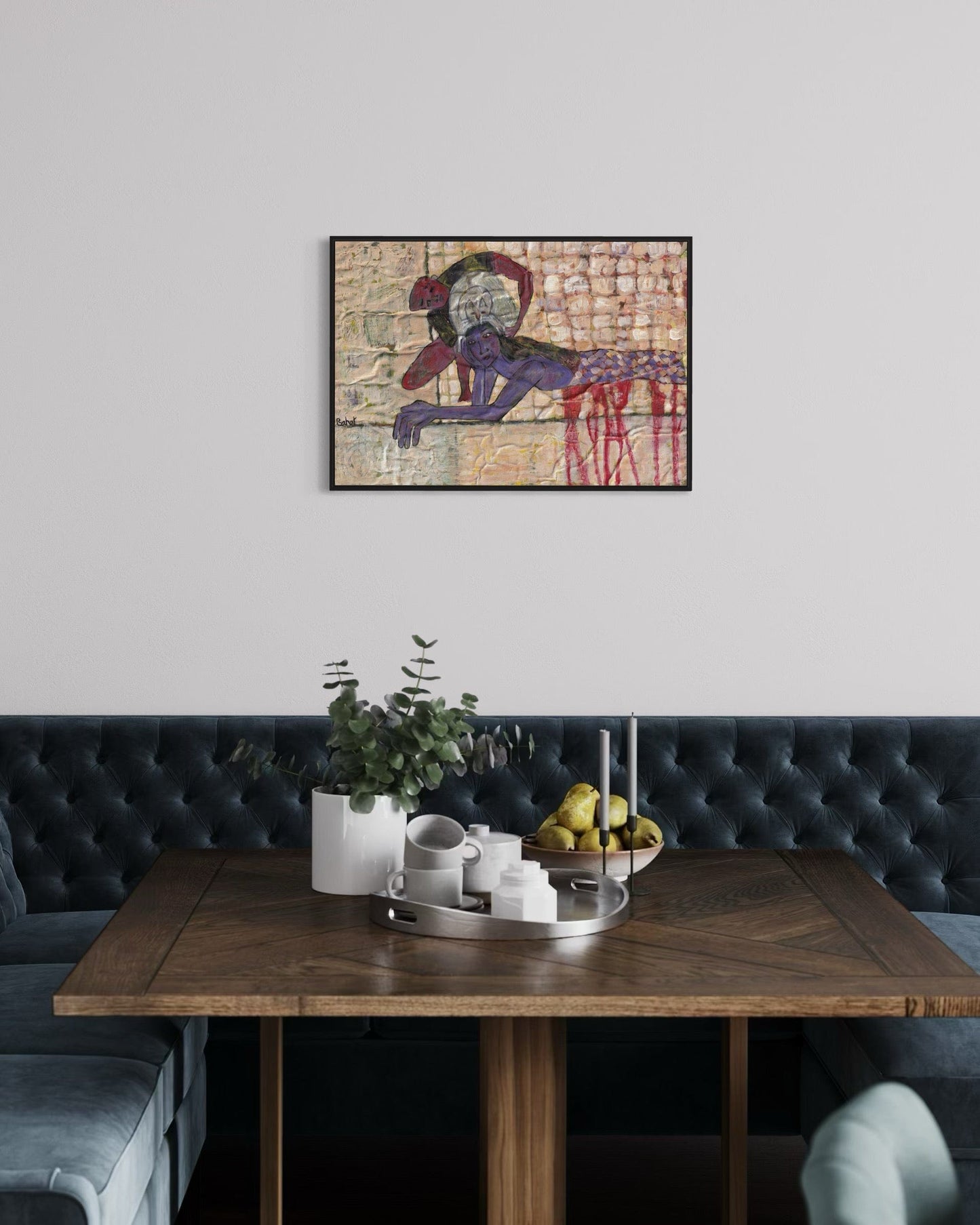 Modern interior with a wooden table, decorative items, and an abstract painting on the wall.