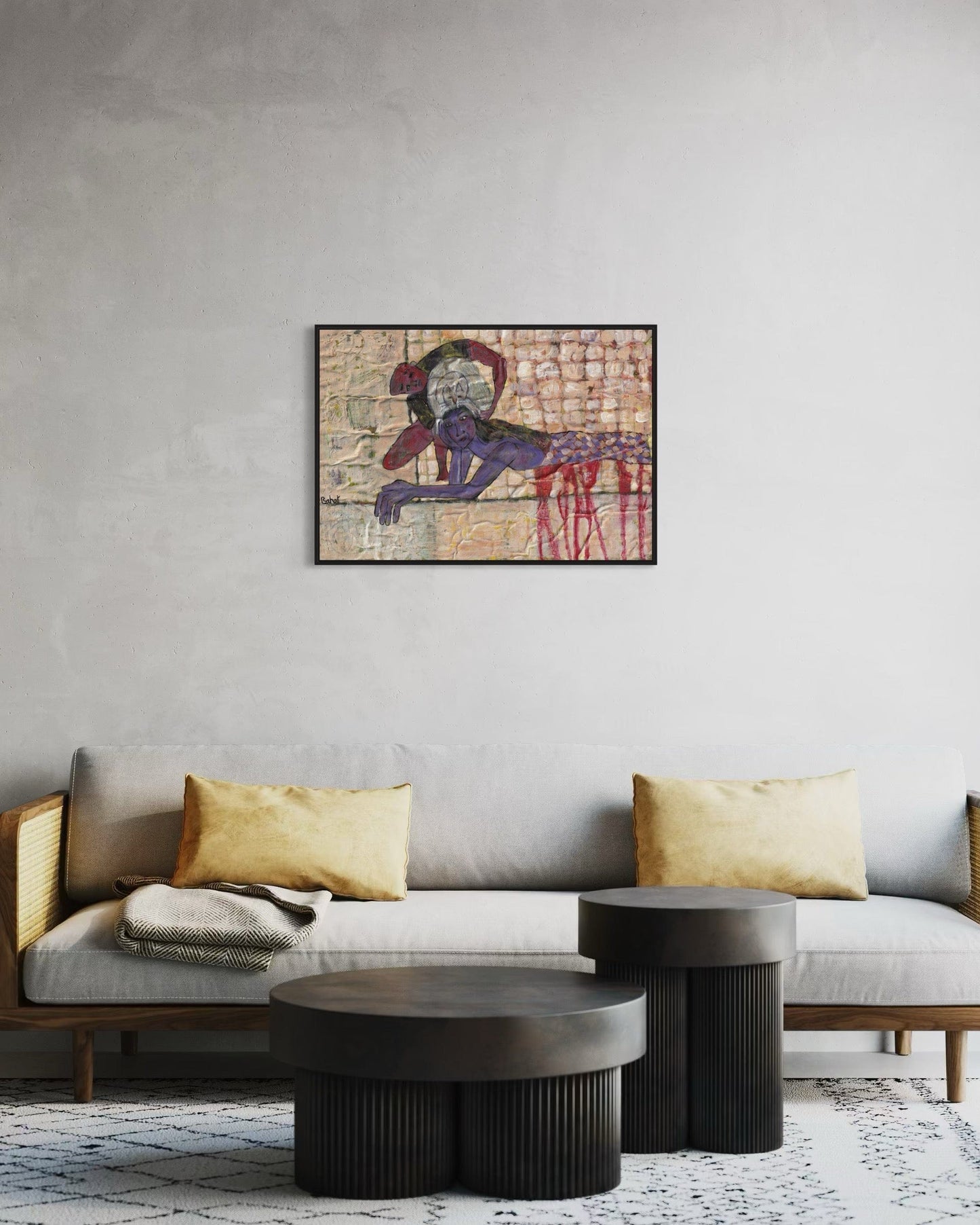 Living room with a gray sofa, gold pillows, and a framed abstract painting on the wall.