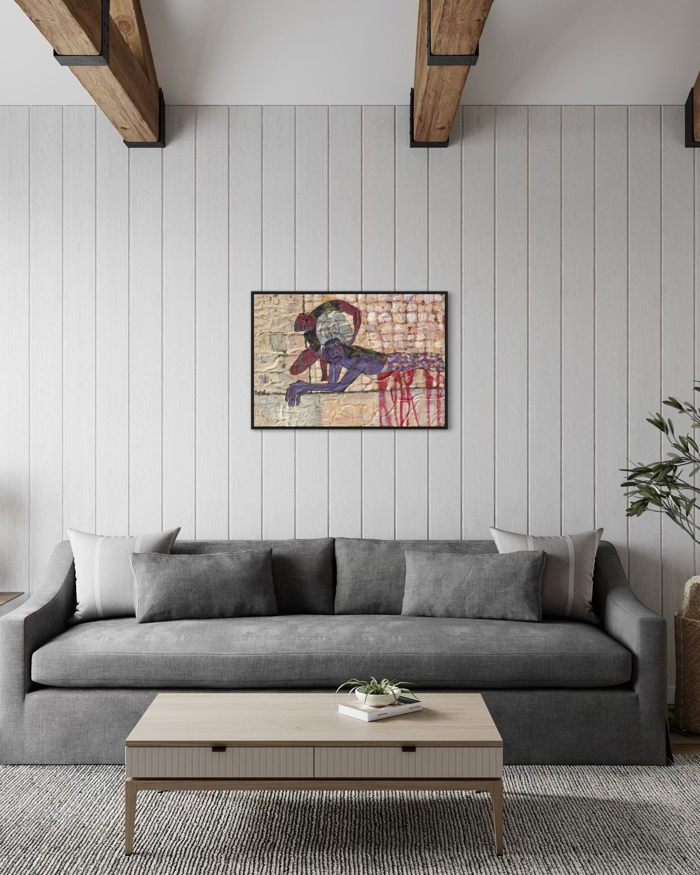 Living room with a gray sofa, wooden coffee table, and abstract painting on the wall.