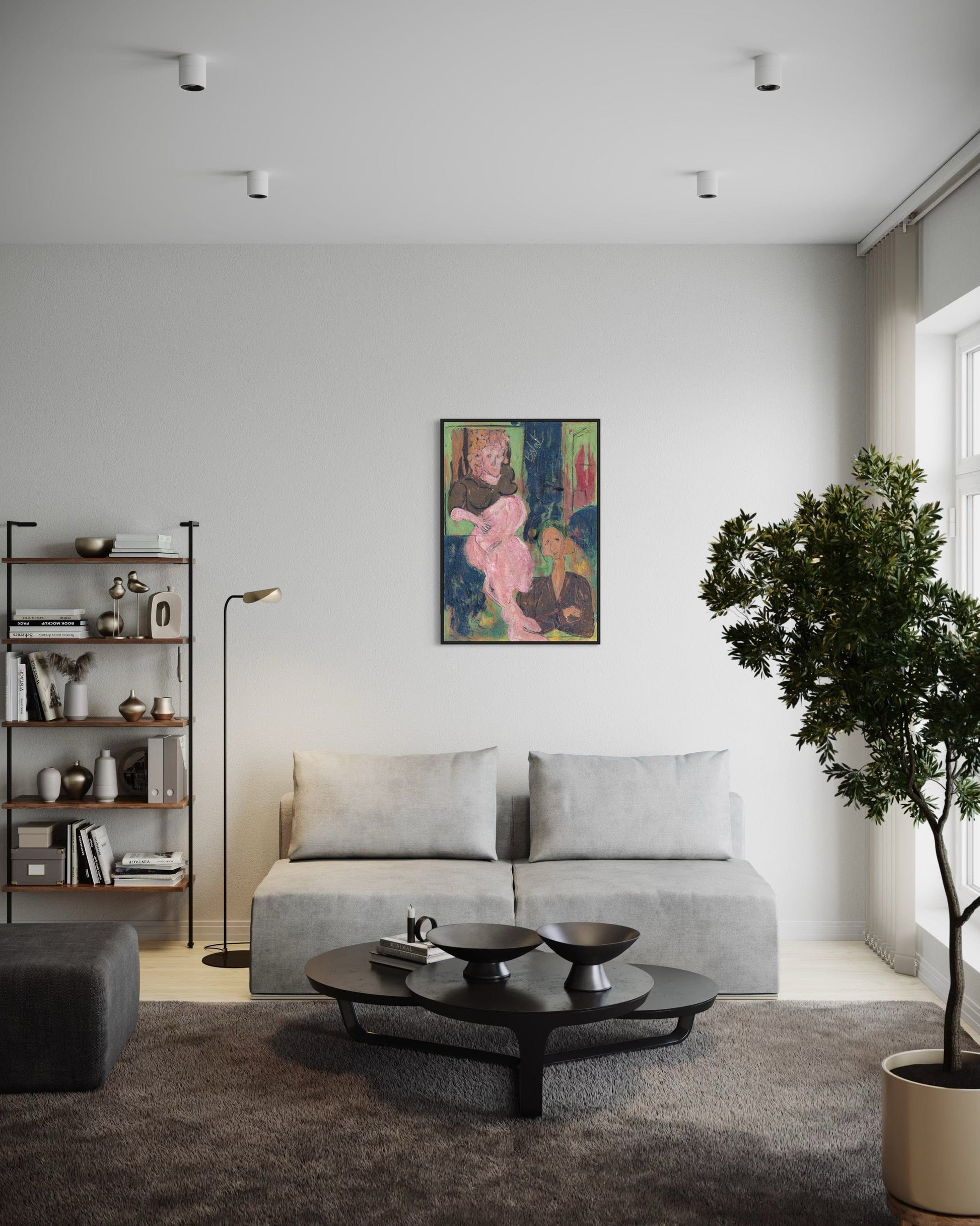 Modern living room with a gray sofa, coffee table, and decorative items.