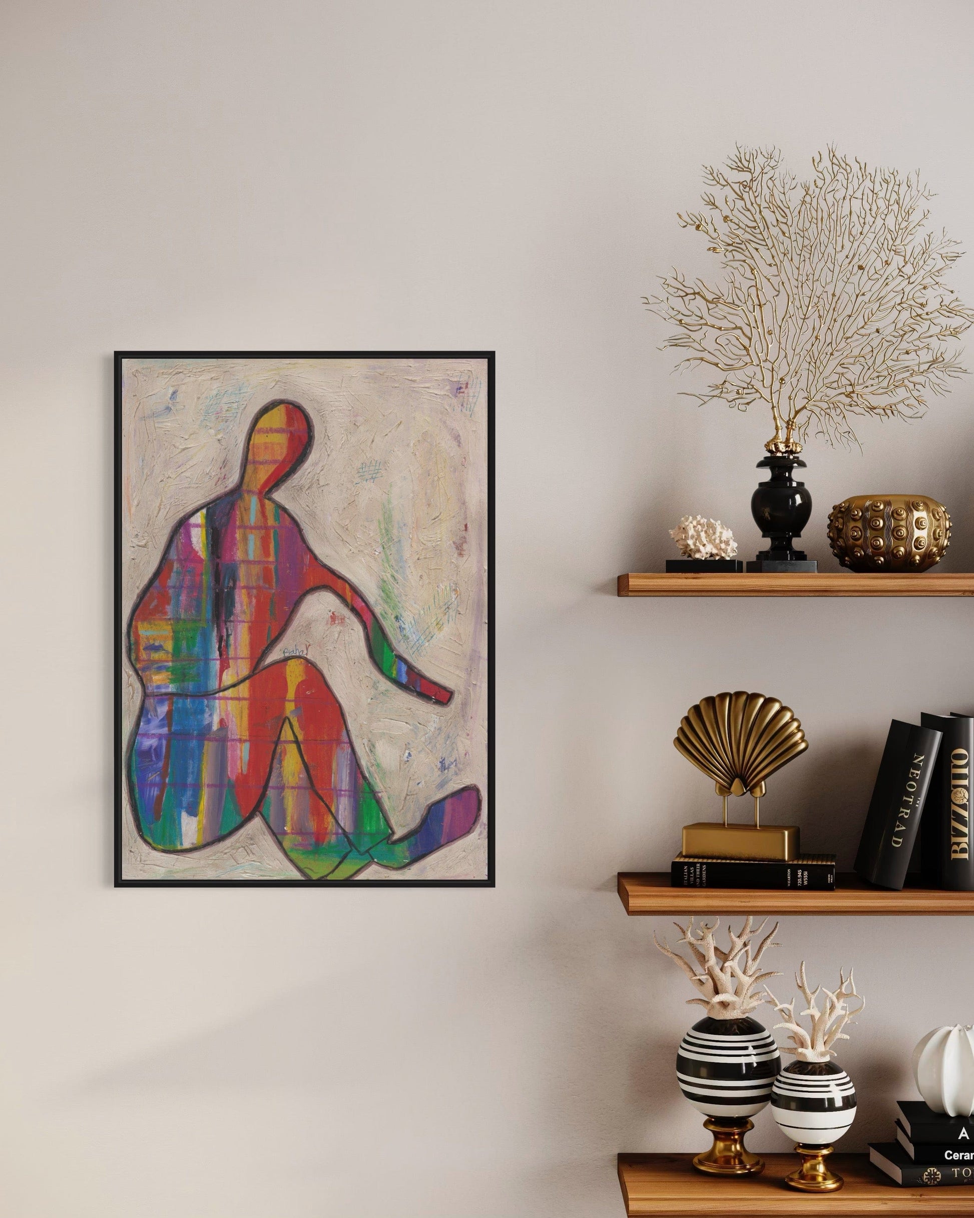Colorful abstract art piece on a wall with decorative shelves below