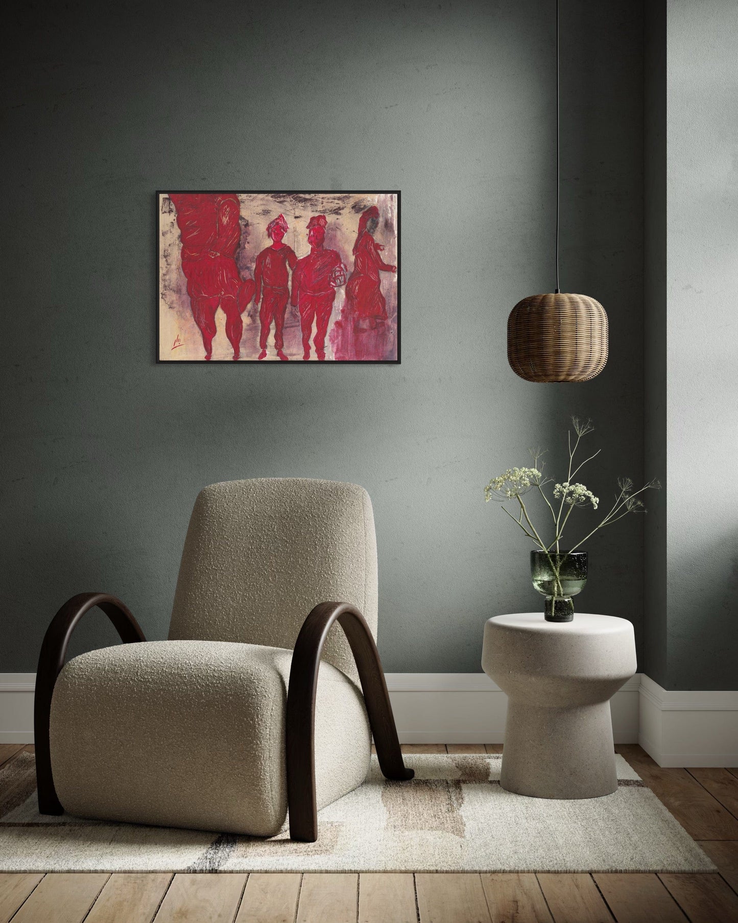 Beige armchair in a room with a gray wall, abstract red painting, and a small table with a plant.