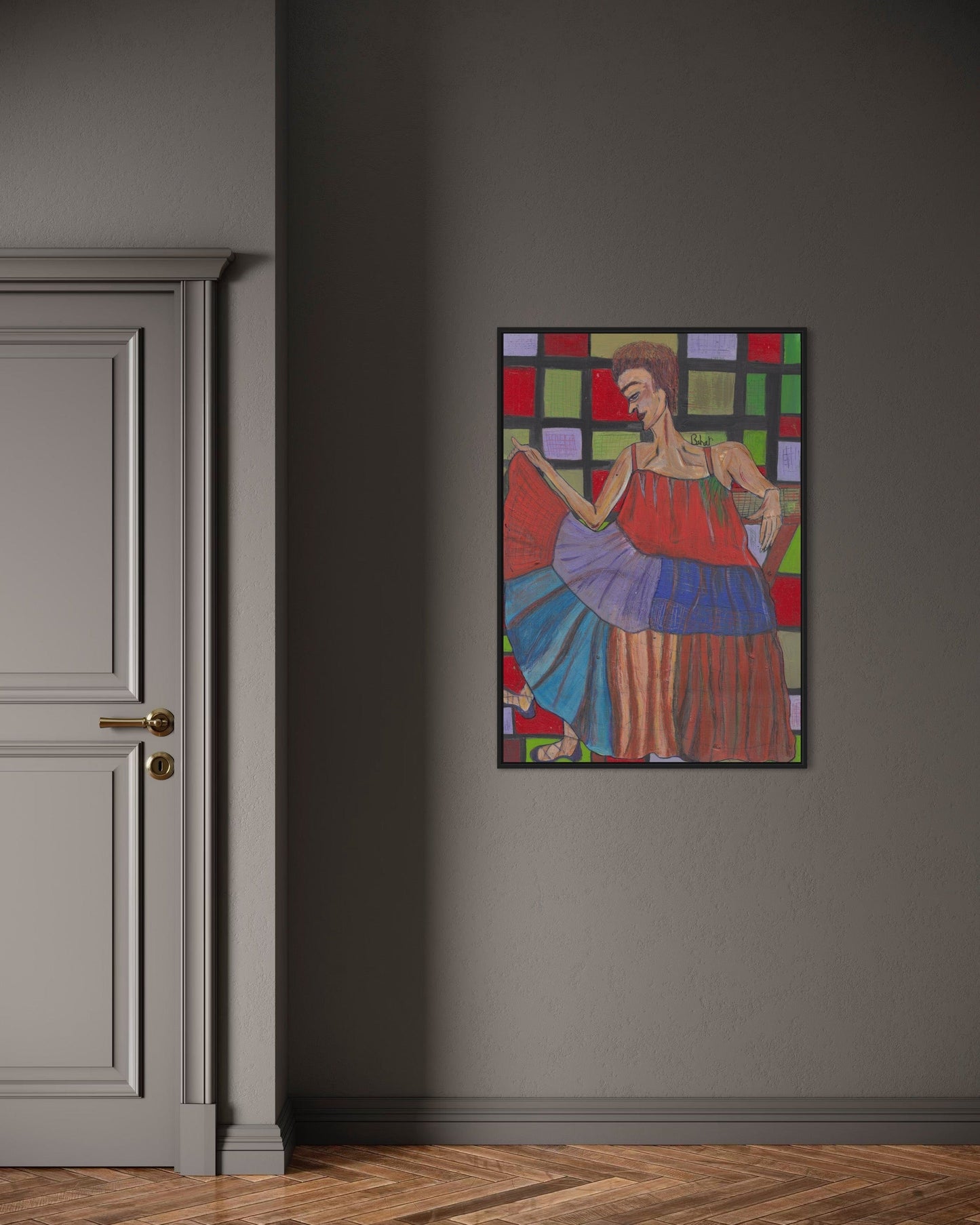 Colorful abstract painting on a gray wall next to a gray door.
