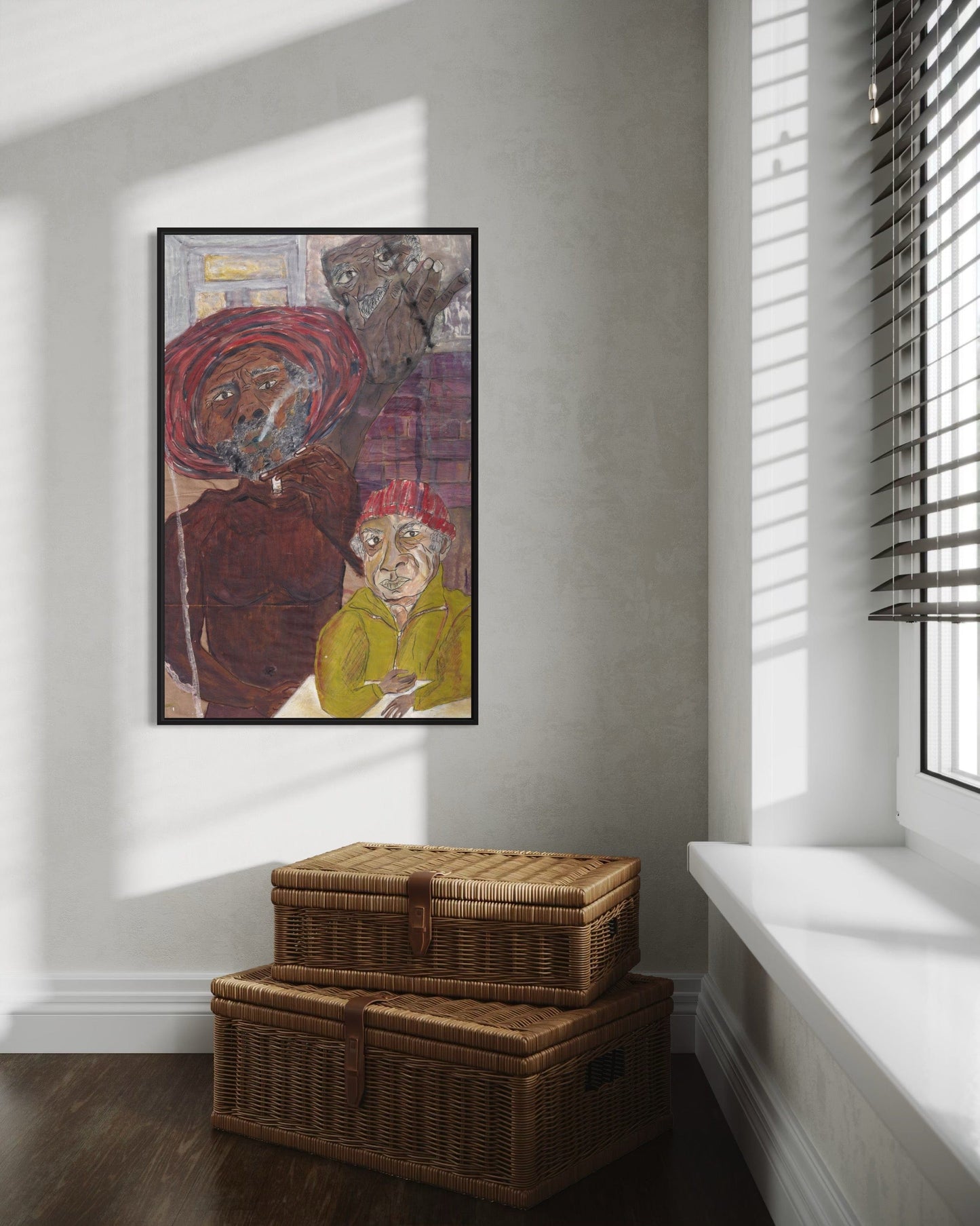 Framed artwork on a wall with wicker storage baskets on the floor.