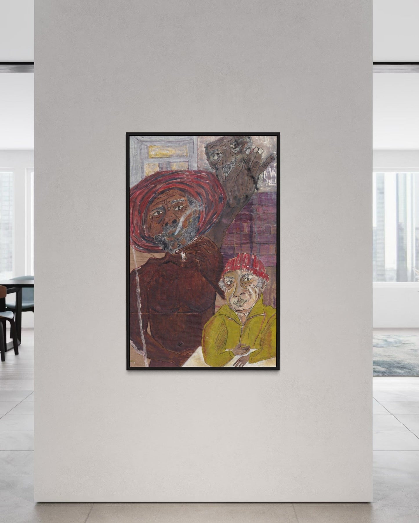 Framed artwork of two figures on a white wall