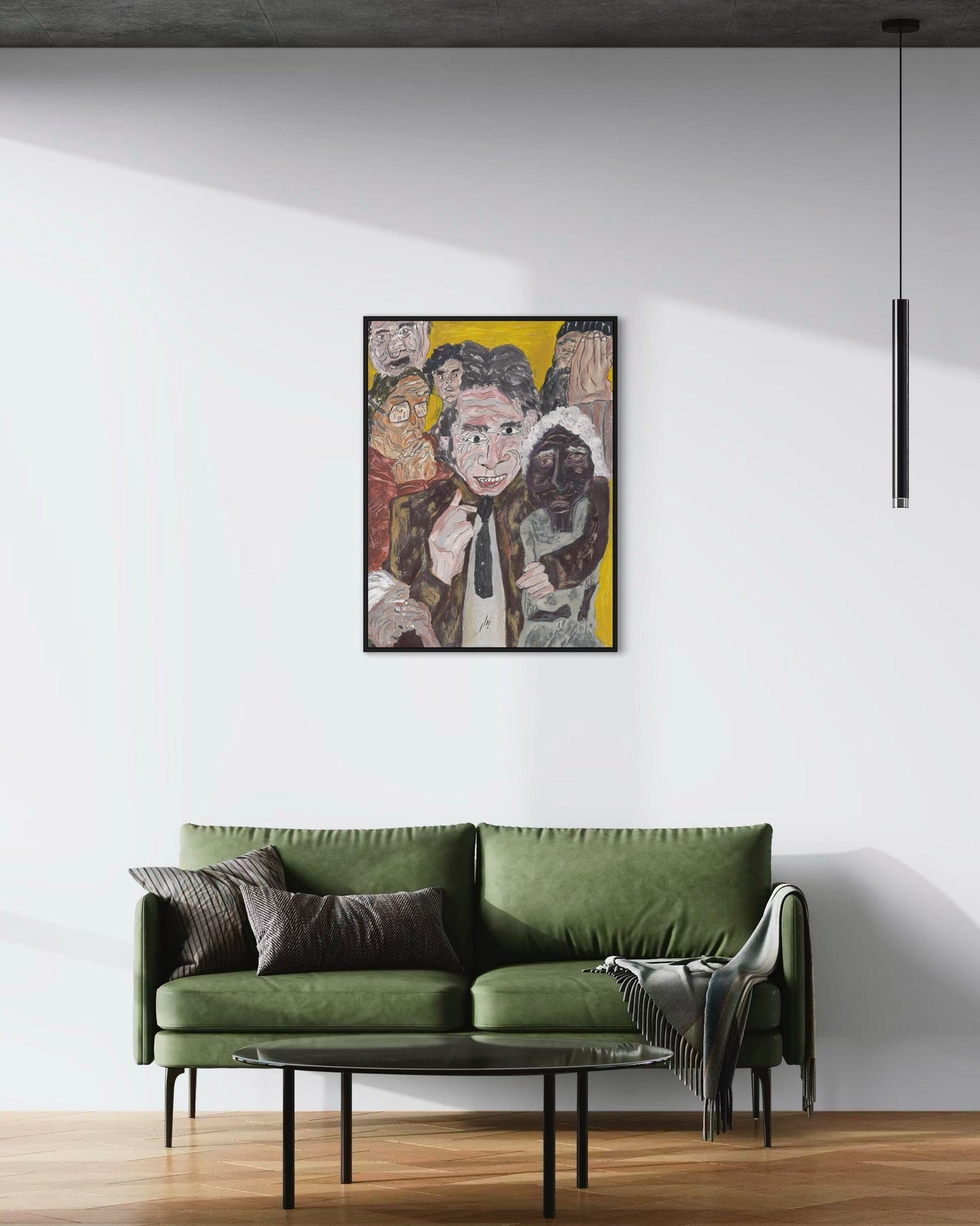 Green sofa in a living room with a colorful abstract painting on the wall.