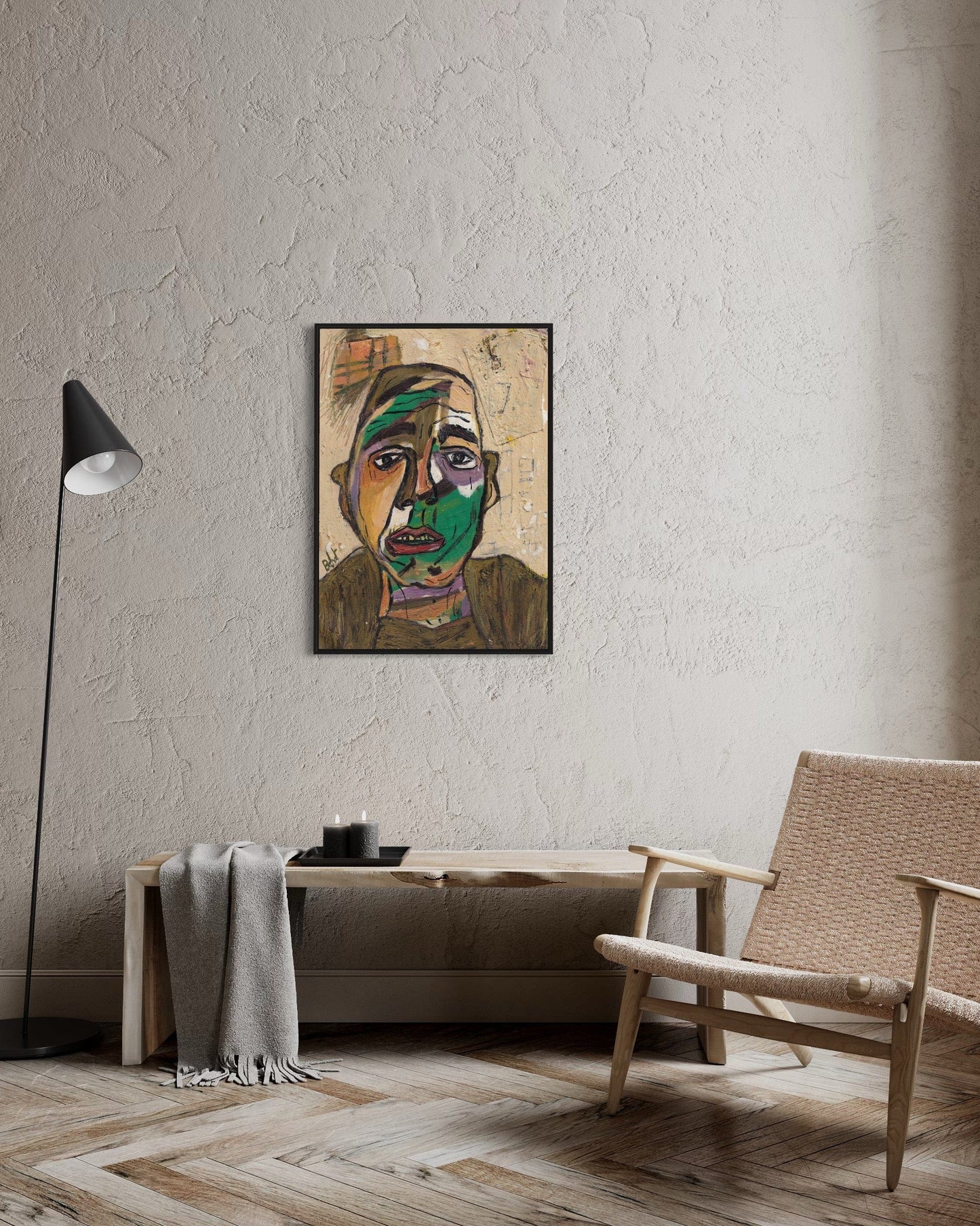 Abstract painting of a face on a wall in a modern living room.