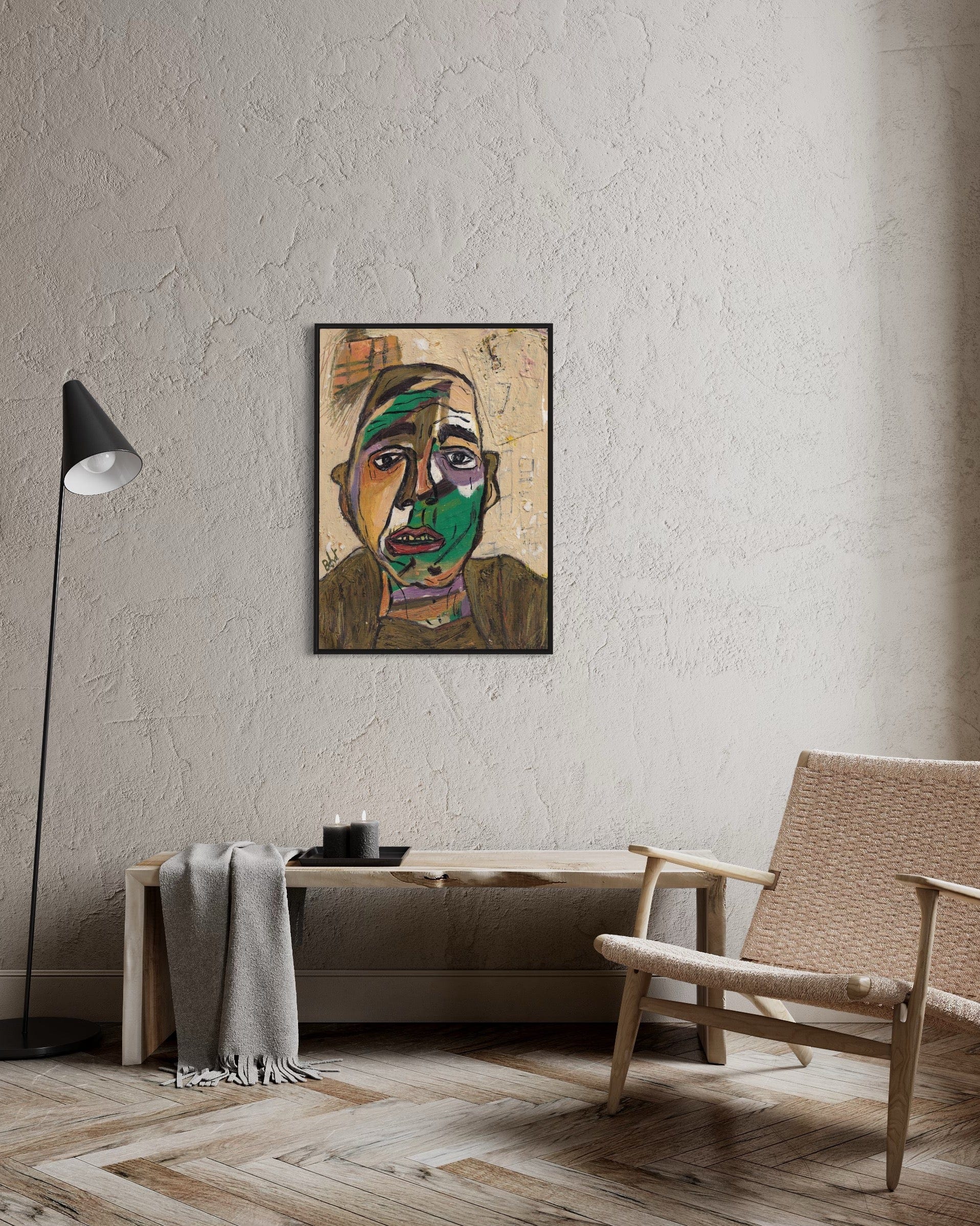Abstract painting of a face on a wall in a modern living room.