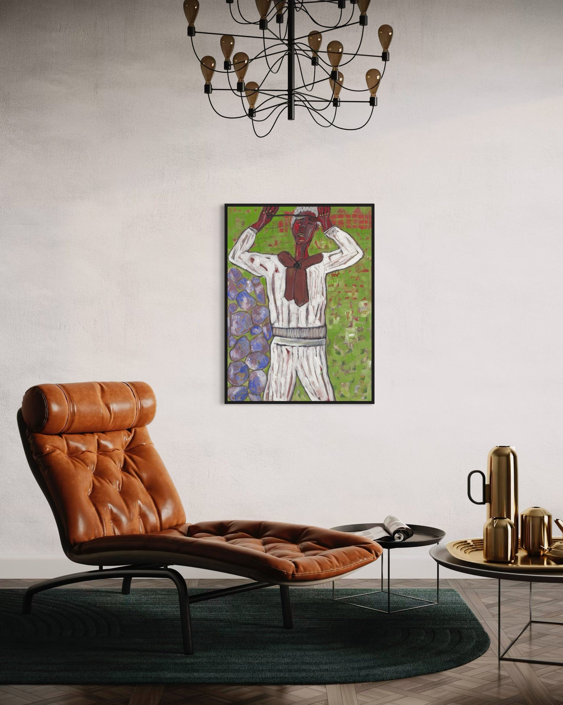 Living room with brown leather chair, framed artwork, and decorative items.