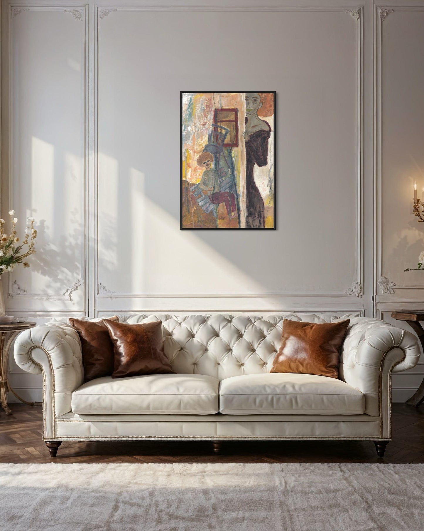 White tufted sofa with brown cushions in a room with a decorative painting on the wall.