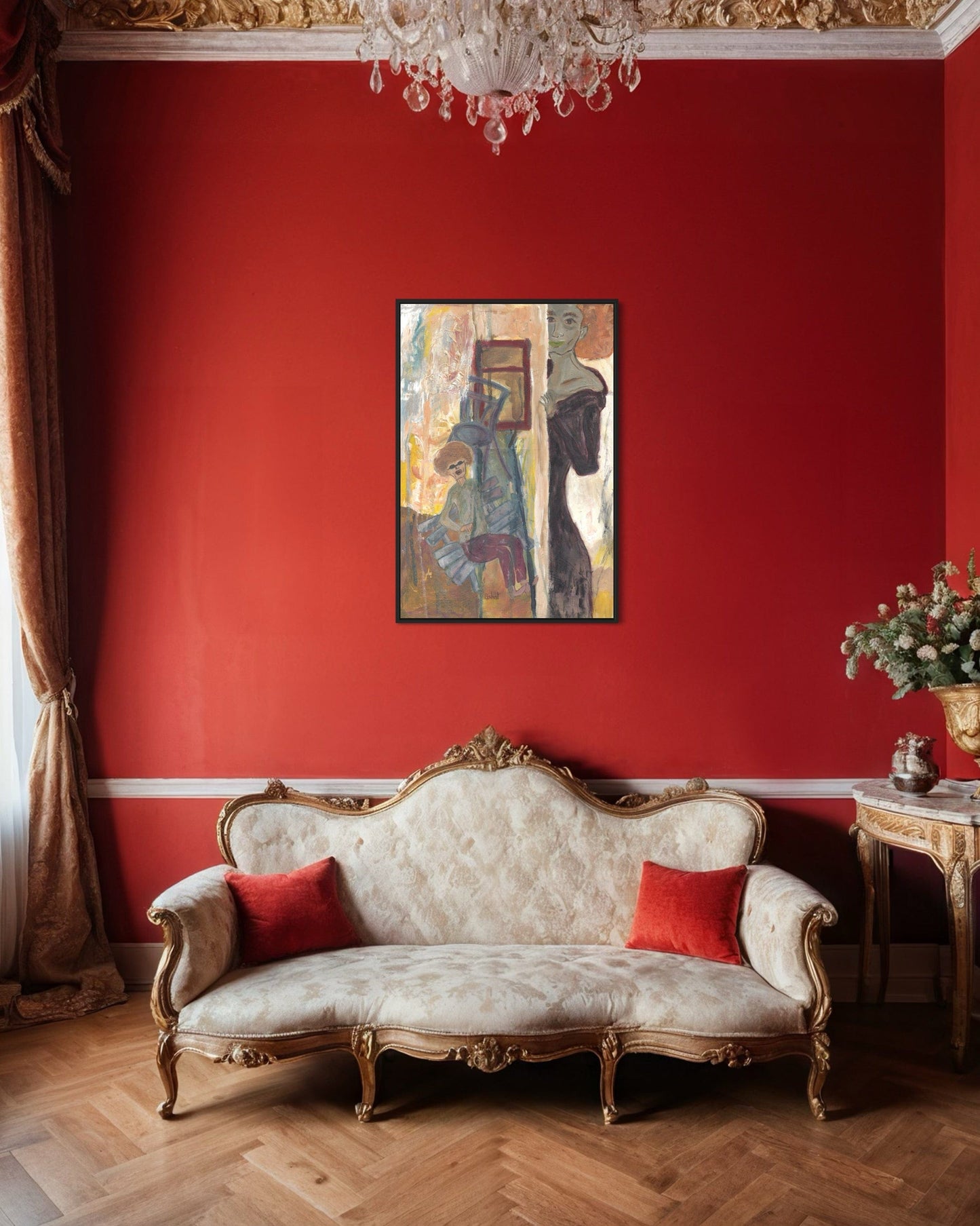 Luxurious living room with red walls, ornate sofa, and framed artwork.