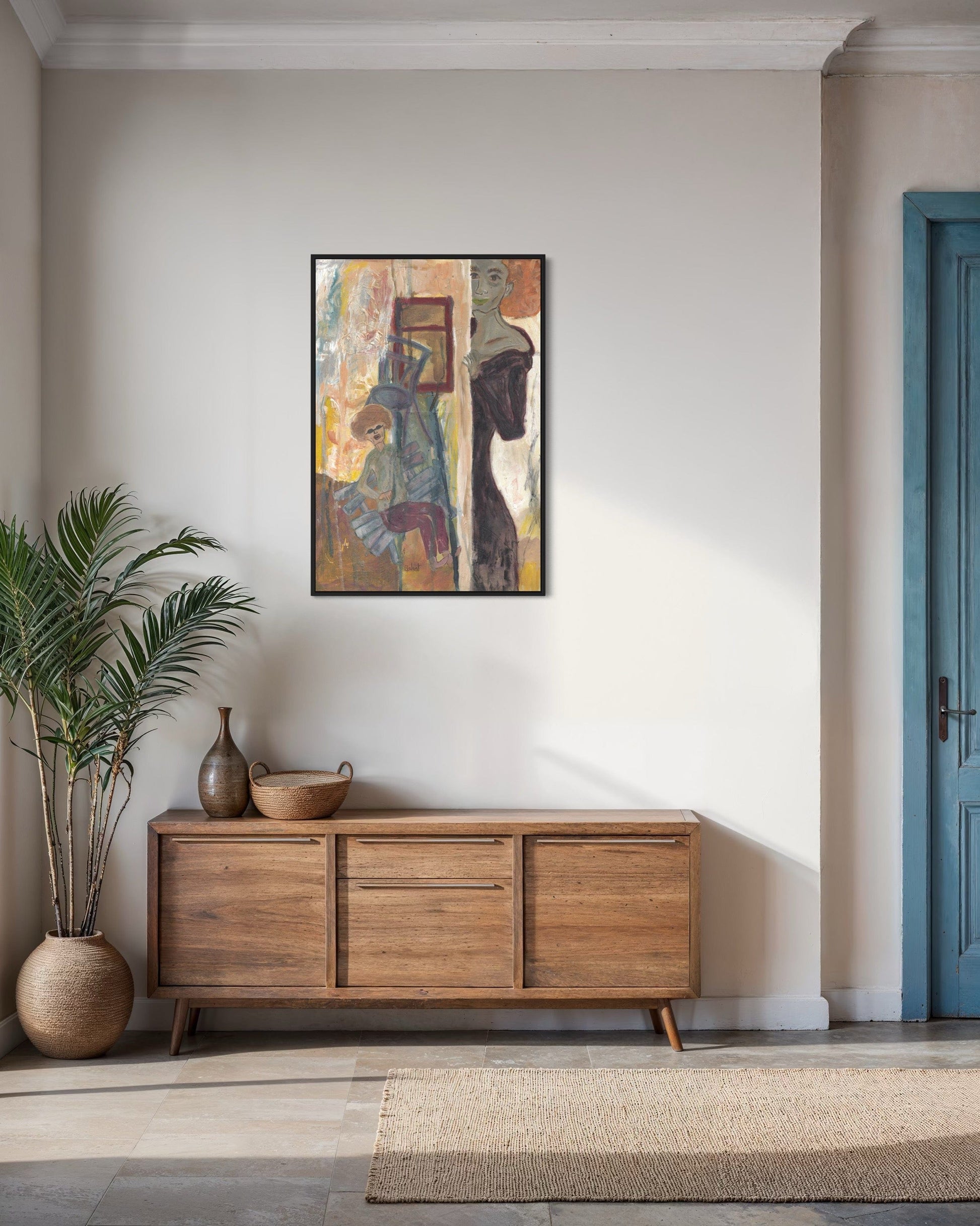 Wooden sideboard with decorative items and a framed abstract painting on a wall.