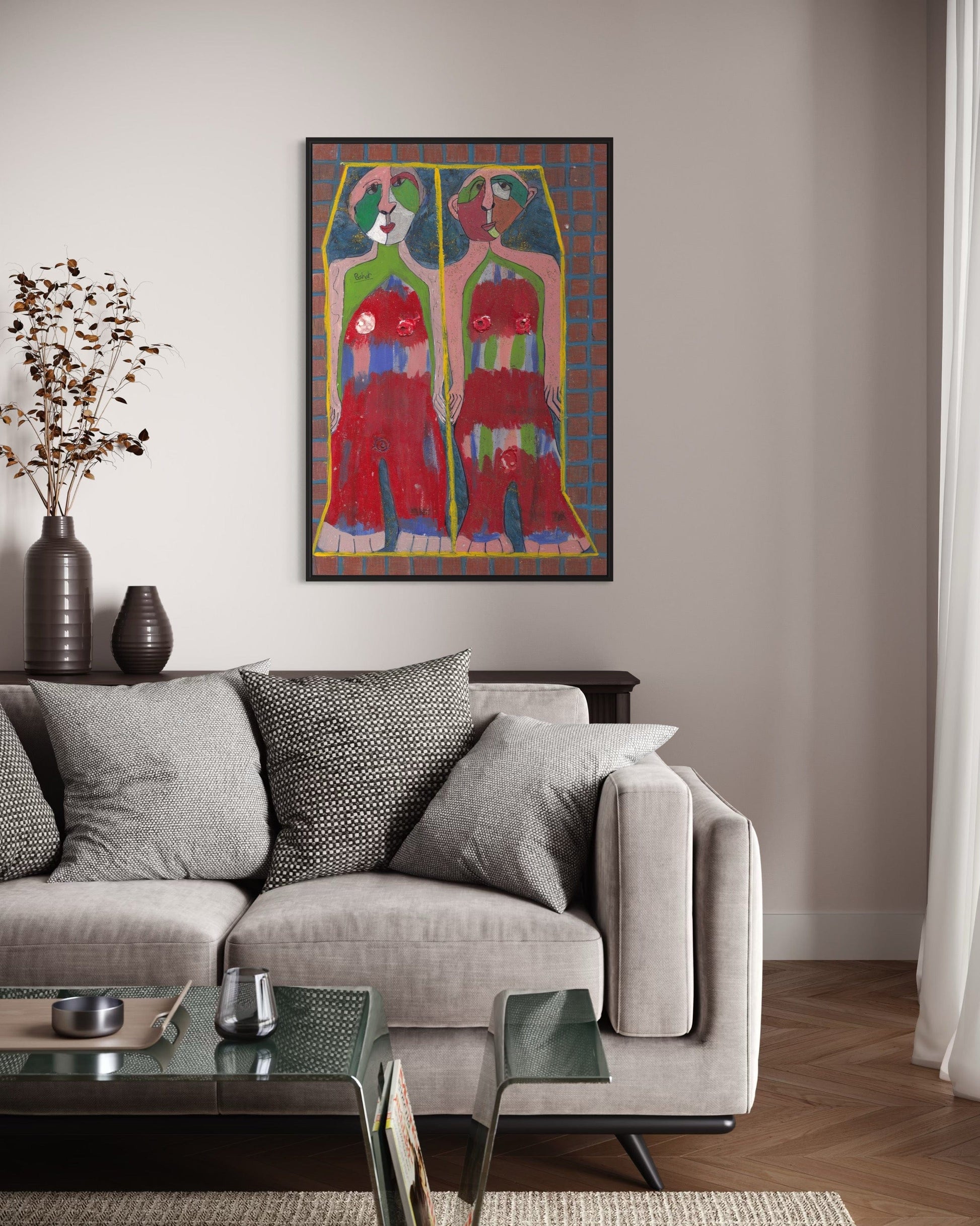 Living room with a gray sofa, glass coffee table, and colorful abstract painting on the wall.