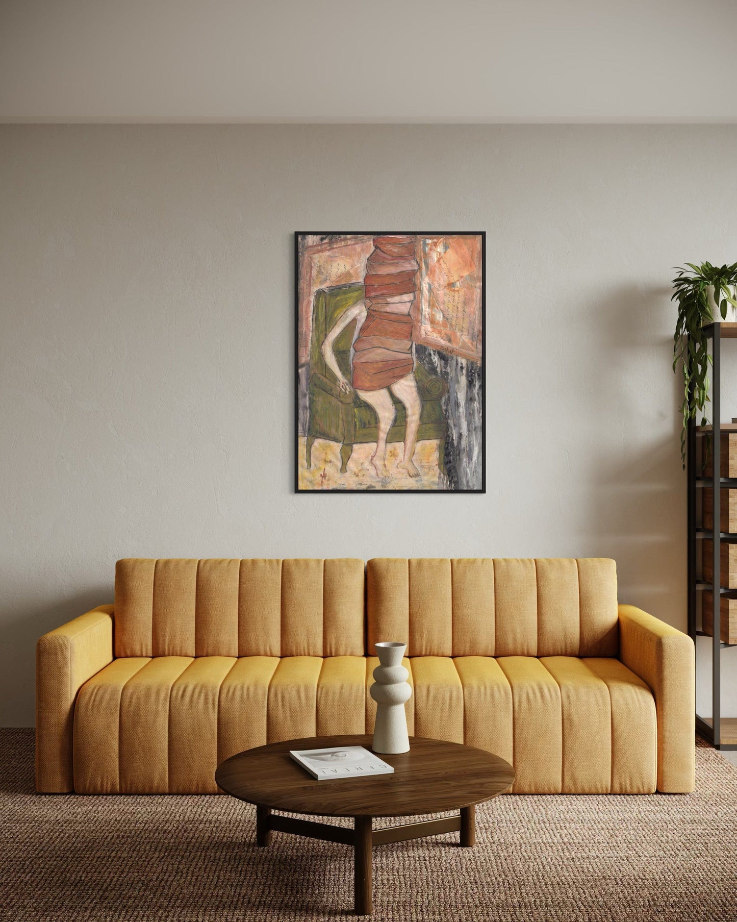 Yellow sofa in a living room with a round wooden coffee table and abstract art on the wall.