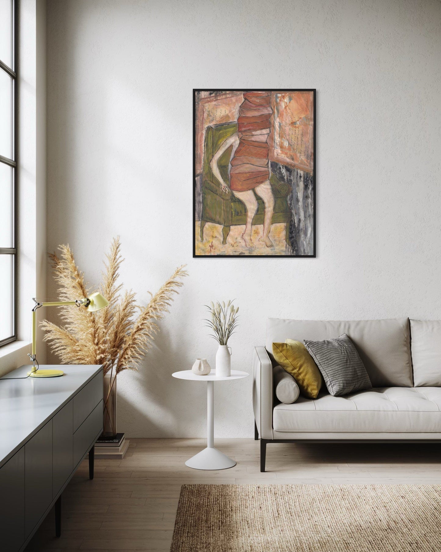 Living room with a sofa, table, and abstract painting on the wall.