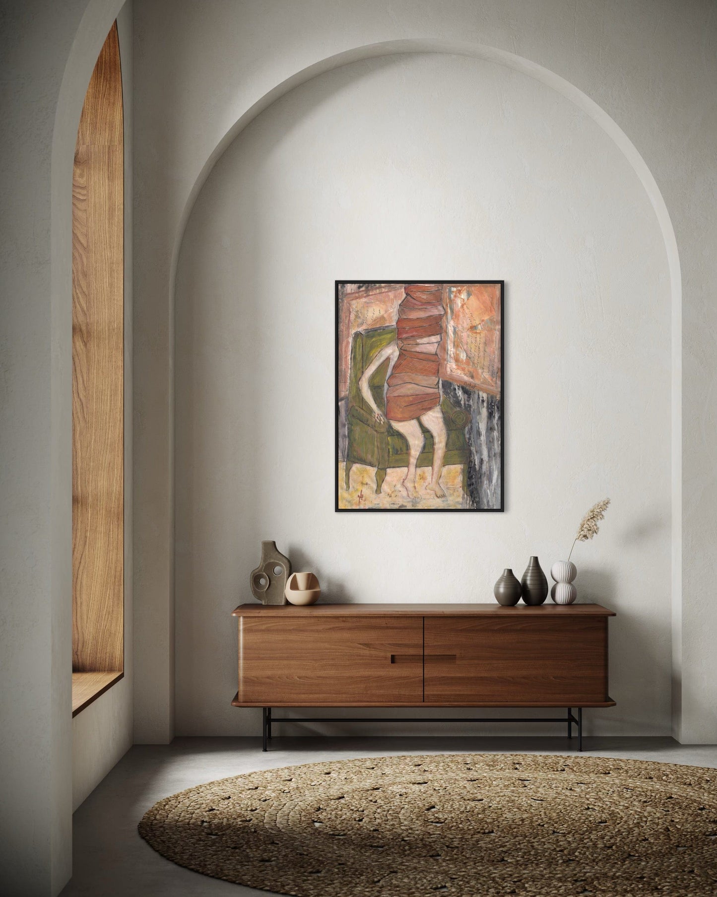 Wooden sideboard with decorative items against a white wall with an archway.