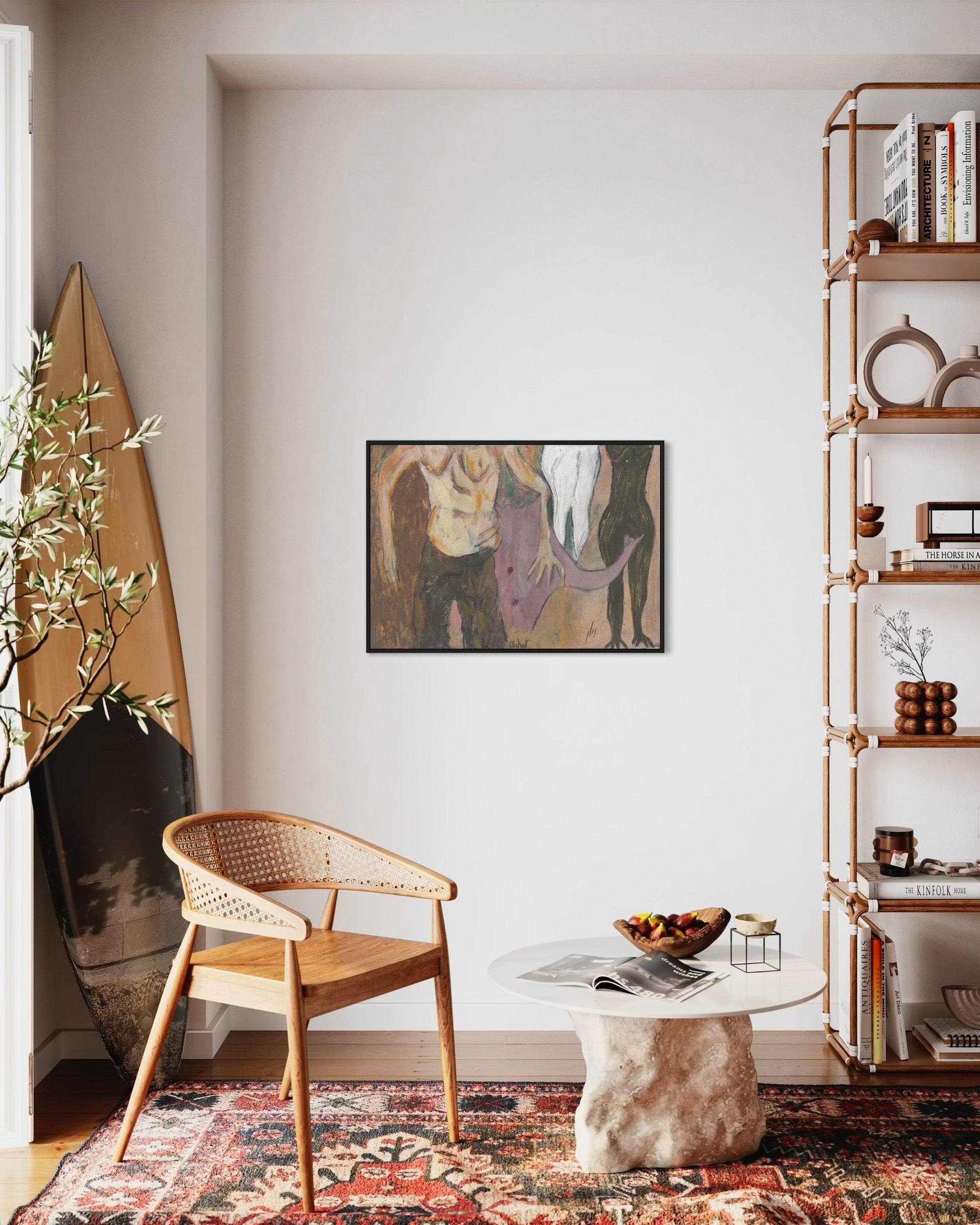 Living room with a wicker chair, round table, and bookshelf.