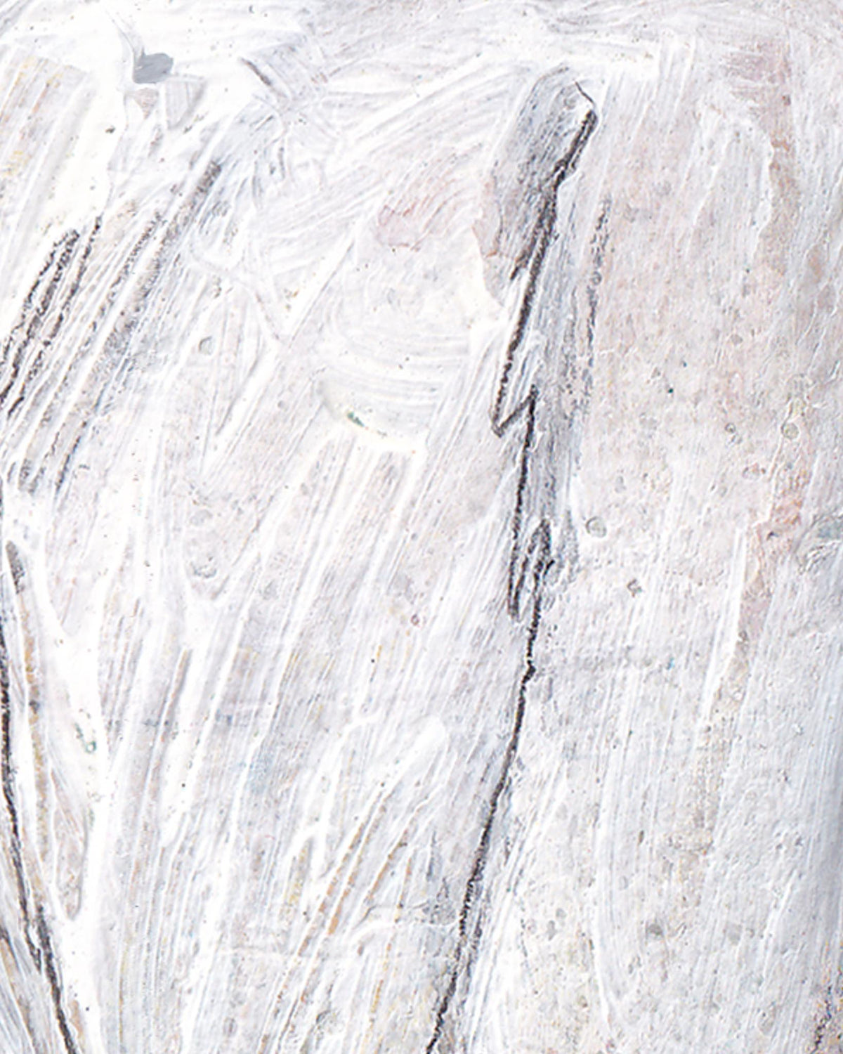 Close-up of a textured white surface with brush strokes