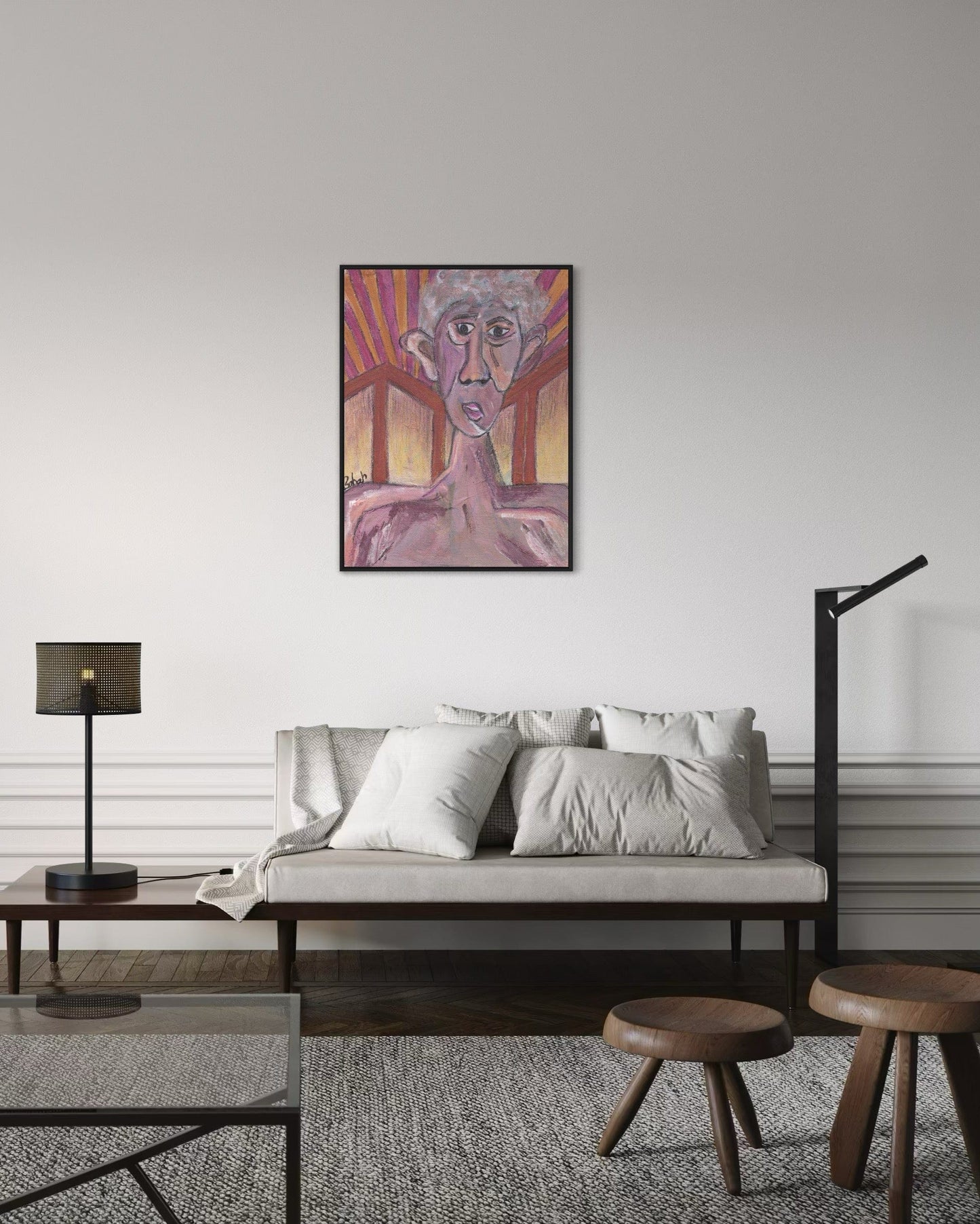 Living room with a painting on the wall above a sofa