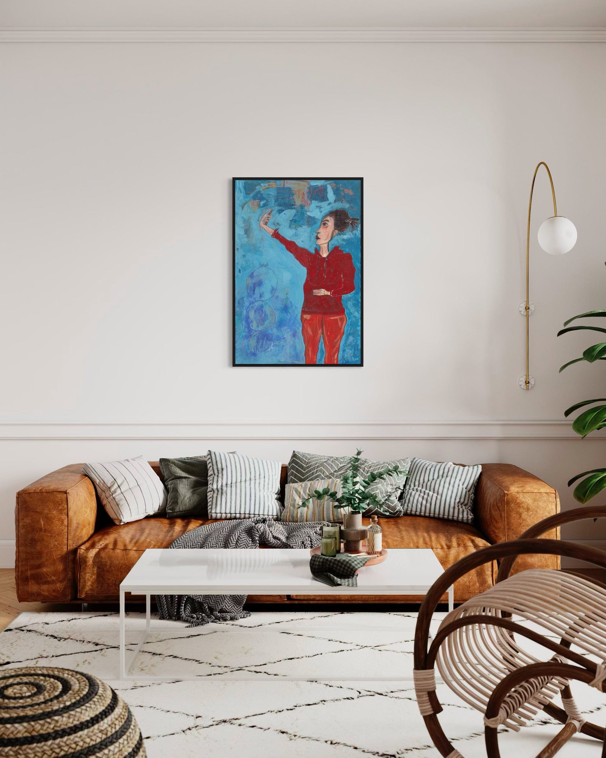 Living room with a brown sofa, coffee table, and decorative items.