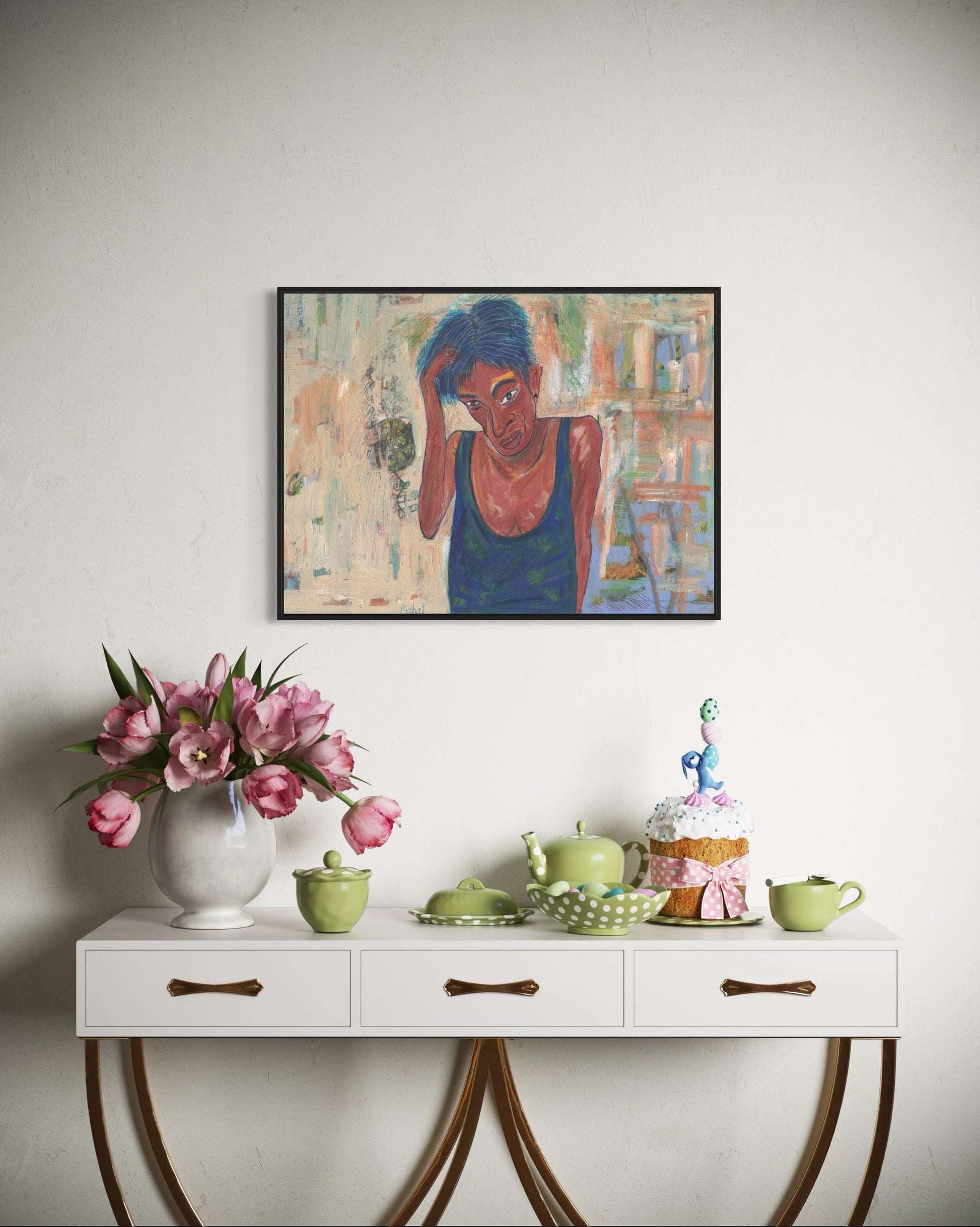 Decorative table with flowers, teacups, and a cake, with a framed painting above.