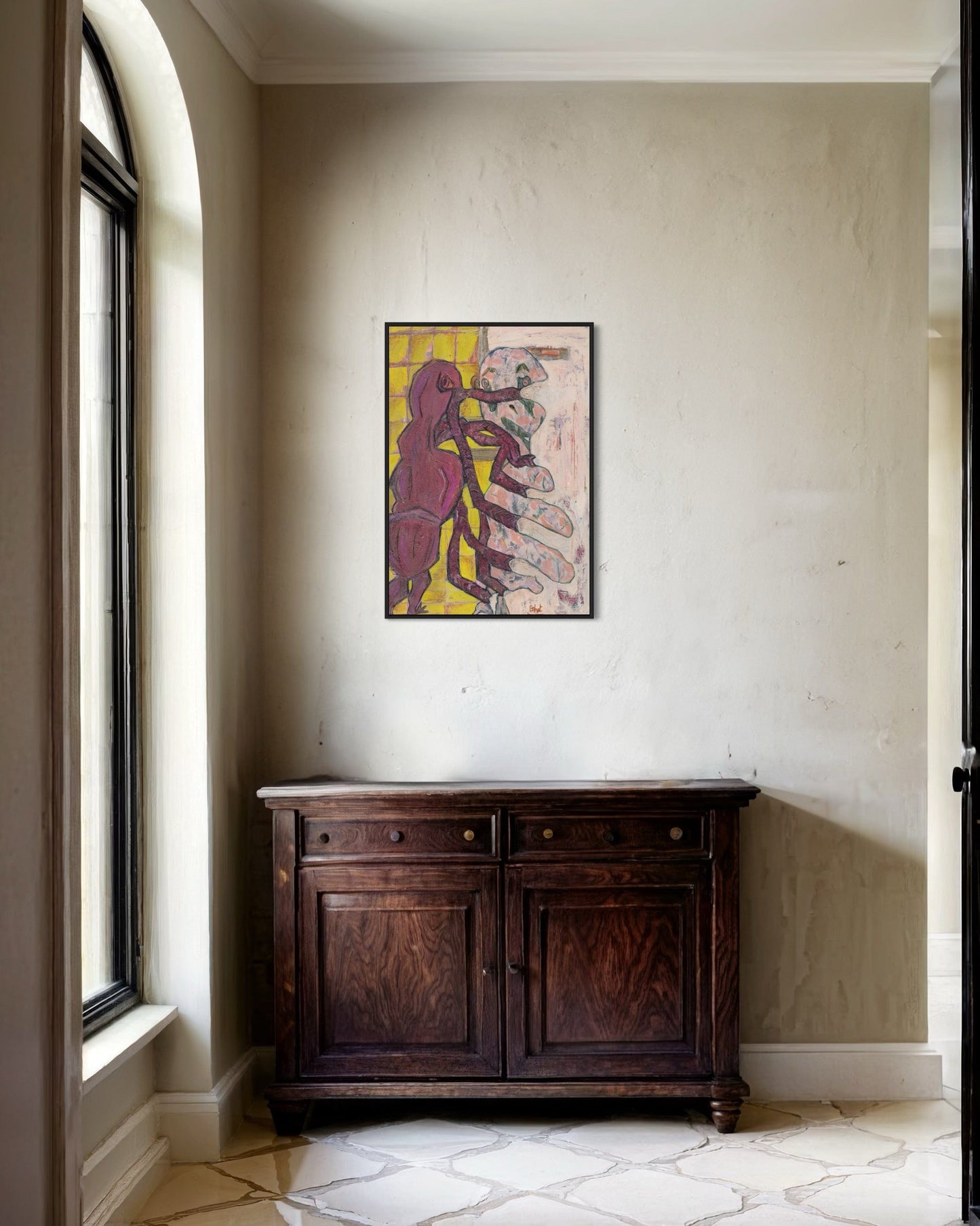 Wooden cabinet below a colorful abstract painting on a white wall.