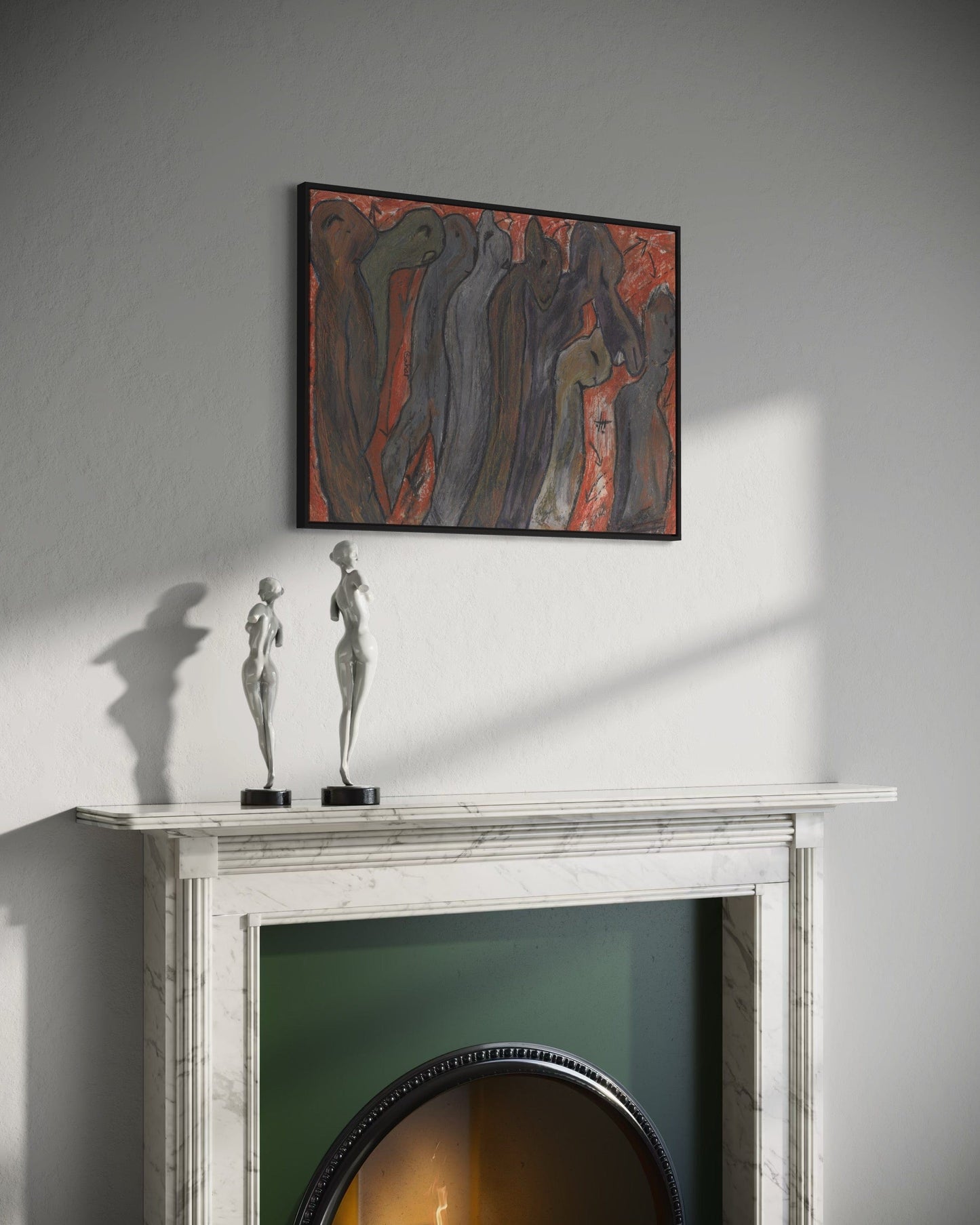 Abstract painting above a fireplace with two statues on the mantel.
