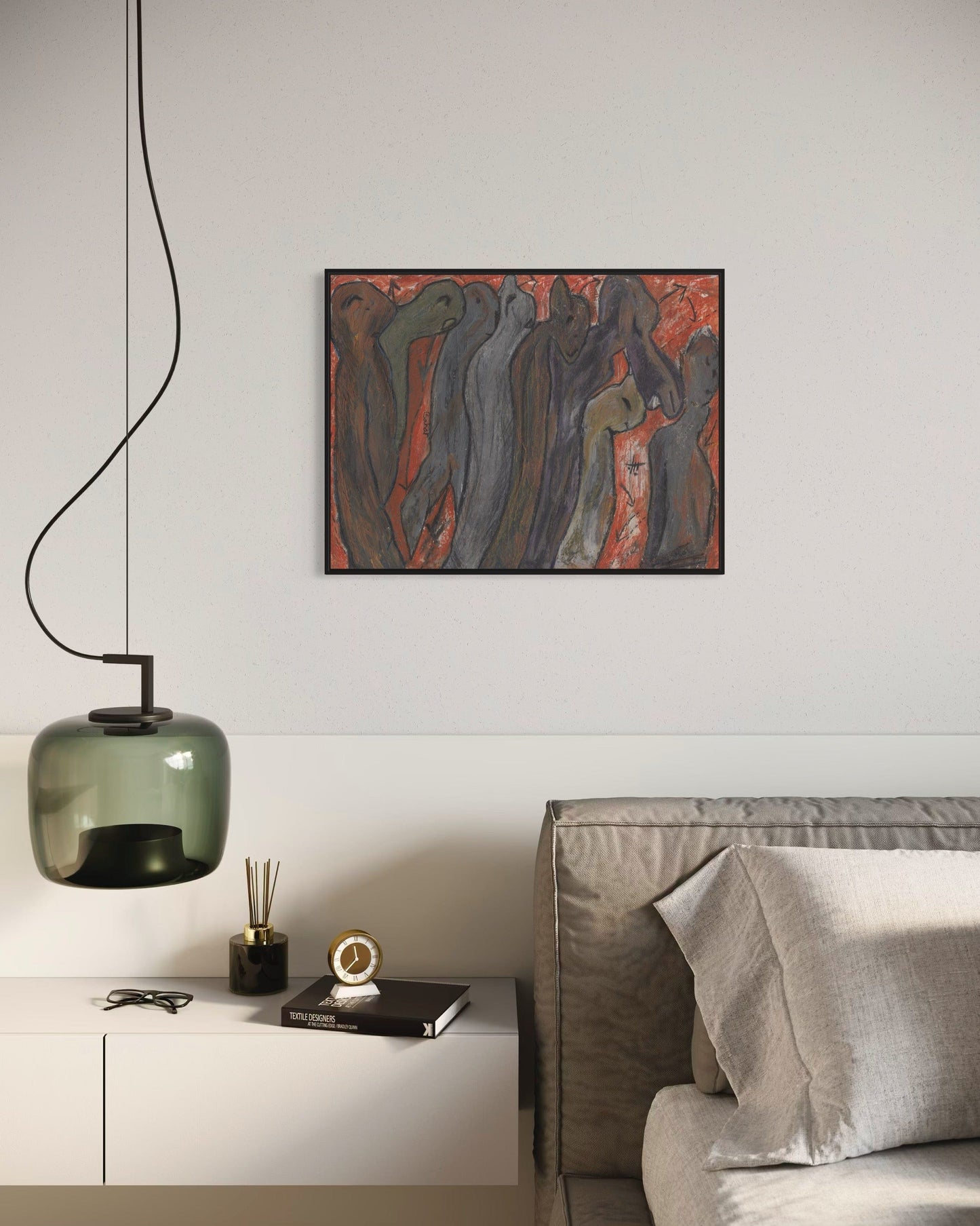 Modern living room with abstract painting, pendant light, and sofa.