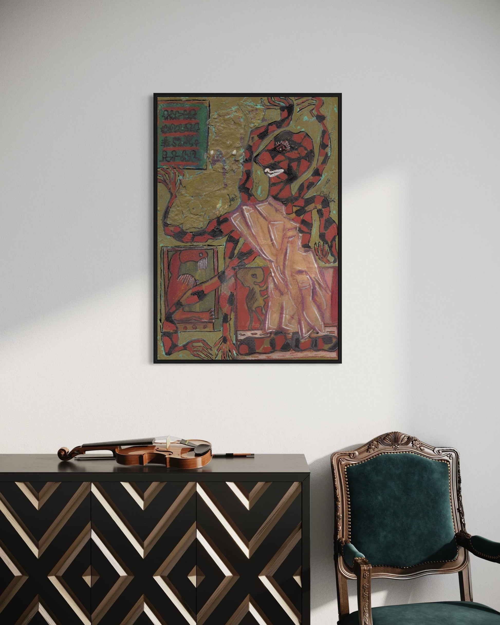Decorative wall art above a black and gold patterned cabinet with a green chair.