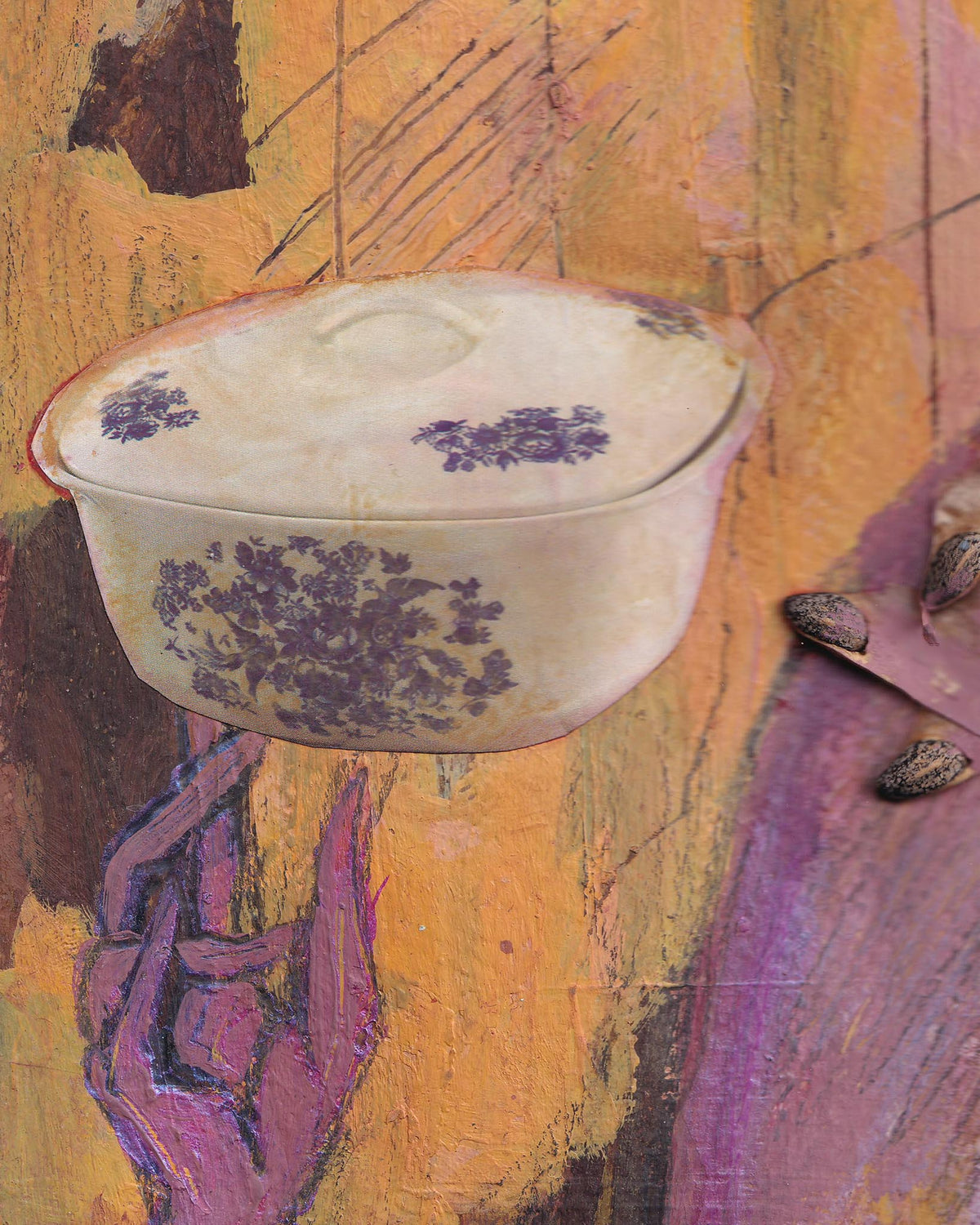 White ceramic casserole dish with purple floral patterns on a textured orange and purple background