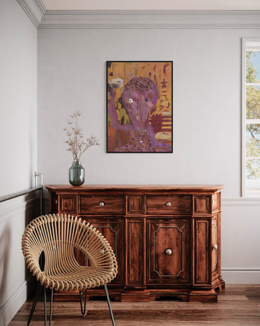 Wooden sideboard with a wicker chair and abstract painting on a light gray wall.