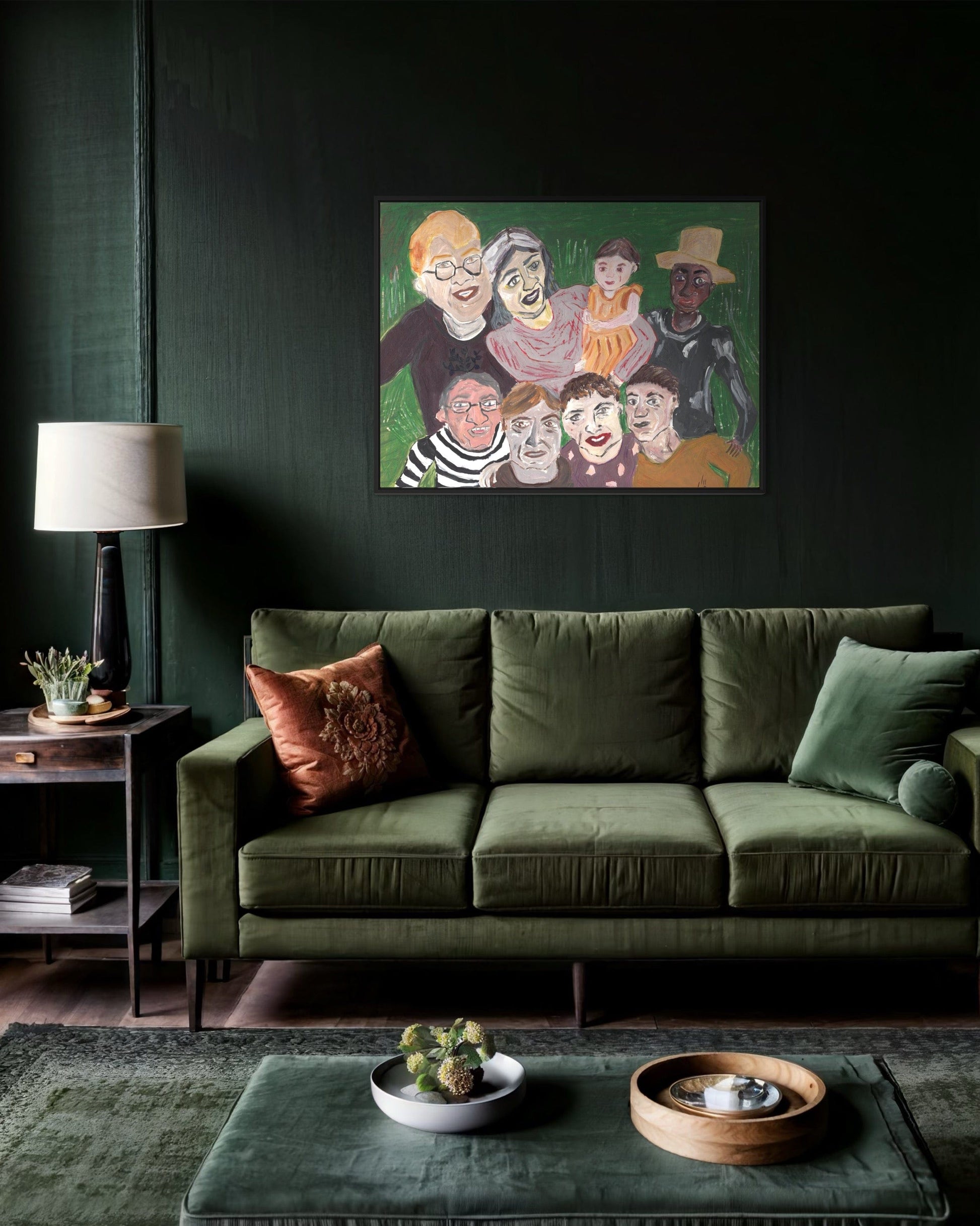 Green sofa in a room with a dark wall, lamp, and decorative items.